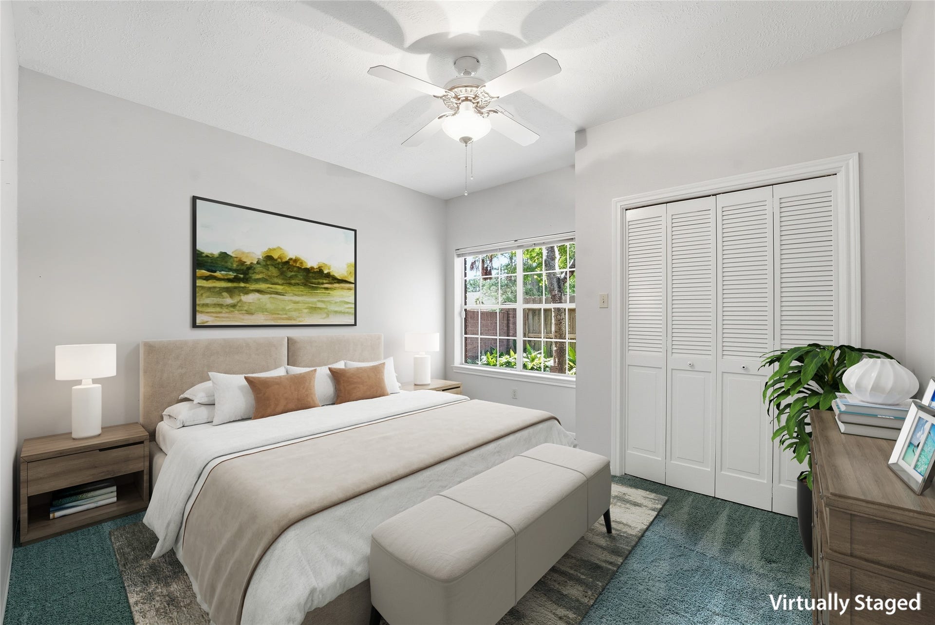 3203 Hickory Brook Lane, Houston, TX 77345 Secondary bedroom with a ceiling fan and closet storage. Virtually staged.