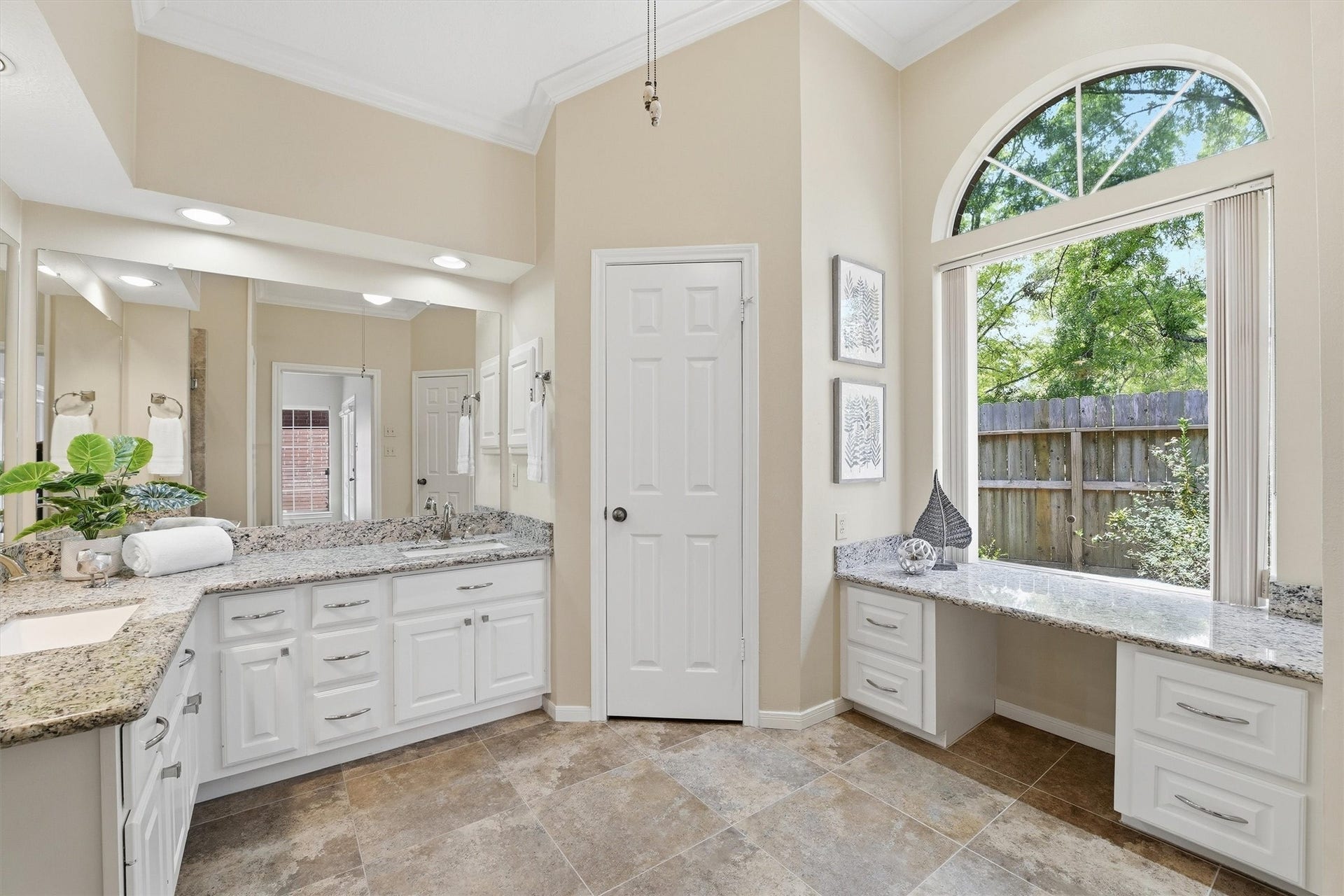 3203 Hickory Brook Lane, Houston, TX 77345 Additional primary bathroom view highlighting the vanity and arched window.