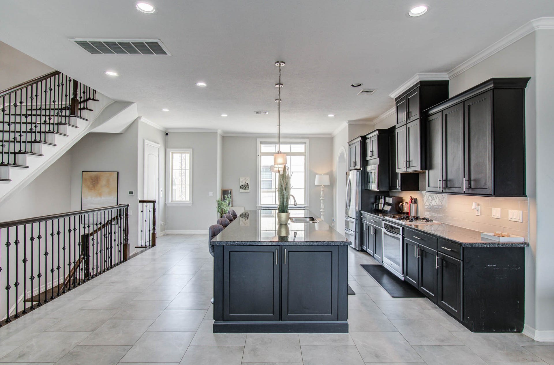 11123 Olympia Drive, Houston, TX 77042 Massive open kitchen, dining, and living concept.