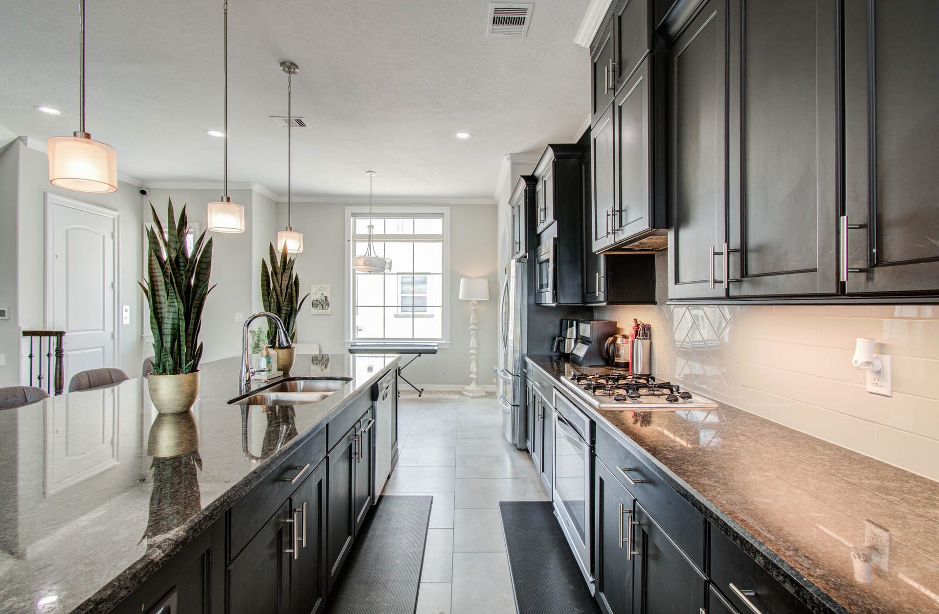 11123 Olympia Drive, Houston, TX 77042 Massive open kitchen, dining, and living concept.