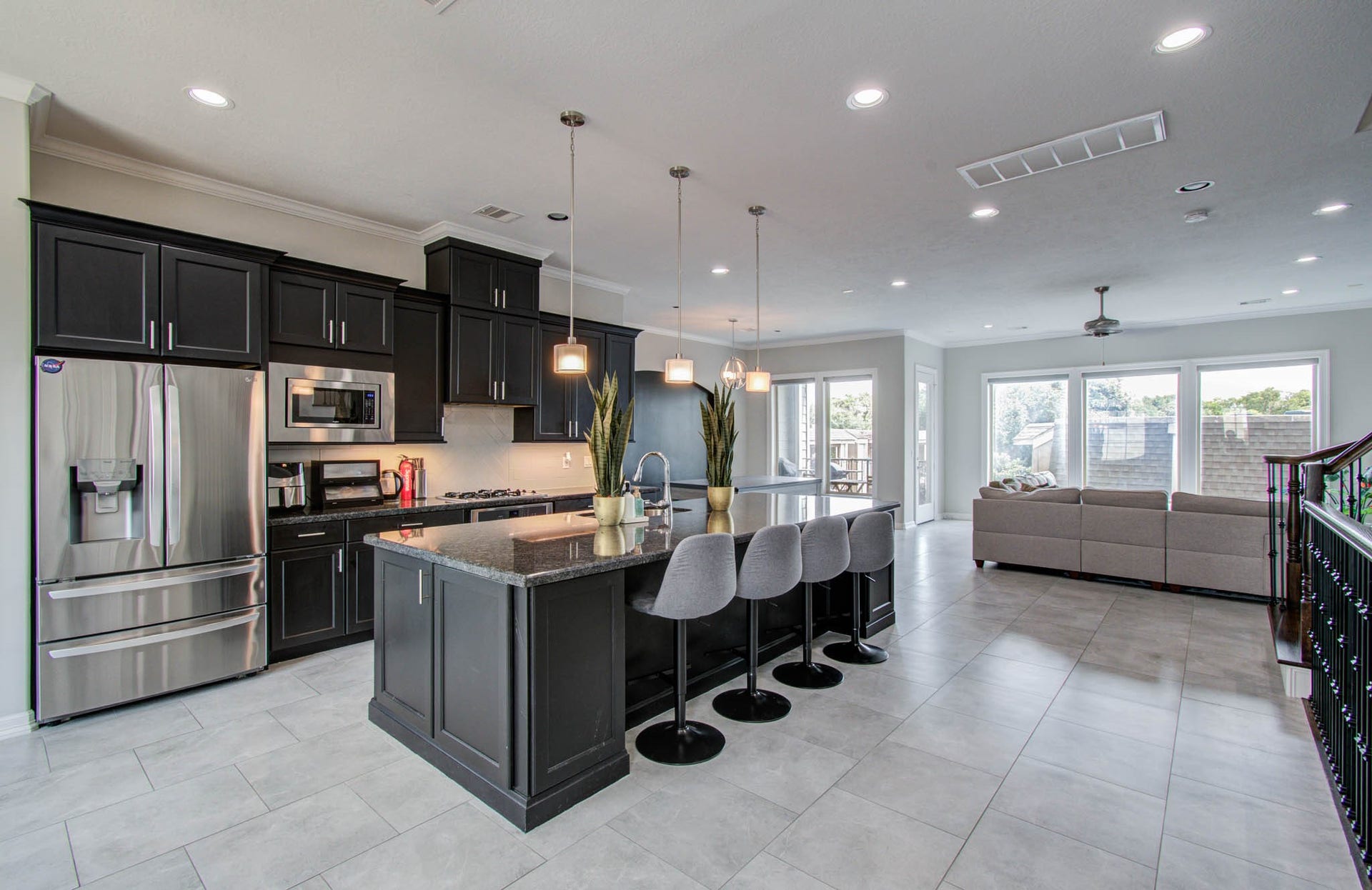 11123 Olympia Drive, Houston, TX 77042 Massive open kitchen, dining, and living concept.