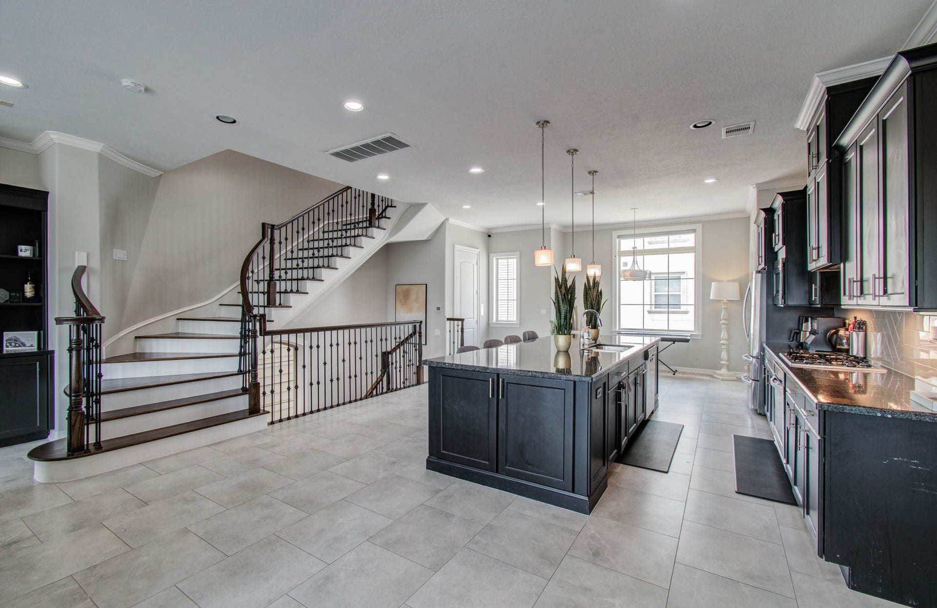 11123 Olympia Drive, Houston, TX 77042 Massive open kitchen, dining, and living concept.