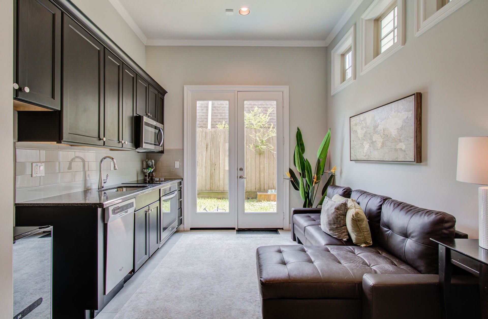 11123 Olympia Drive, Houston, TX 77042 1st floor kitchenette. Includes dishwasher, microwave, oven, and sink.
