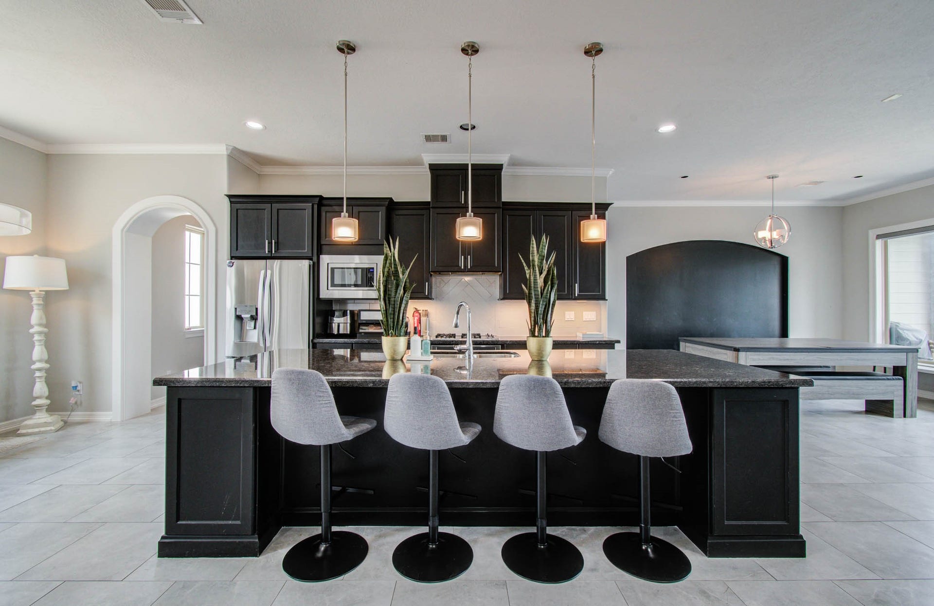11123 Olympia Drive, Houston, TX 77042 Massive open kitchen, dining, and living concept.