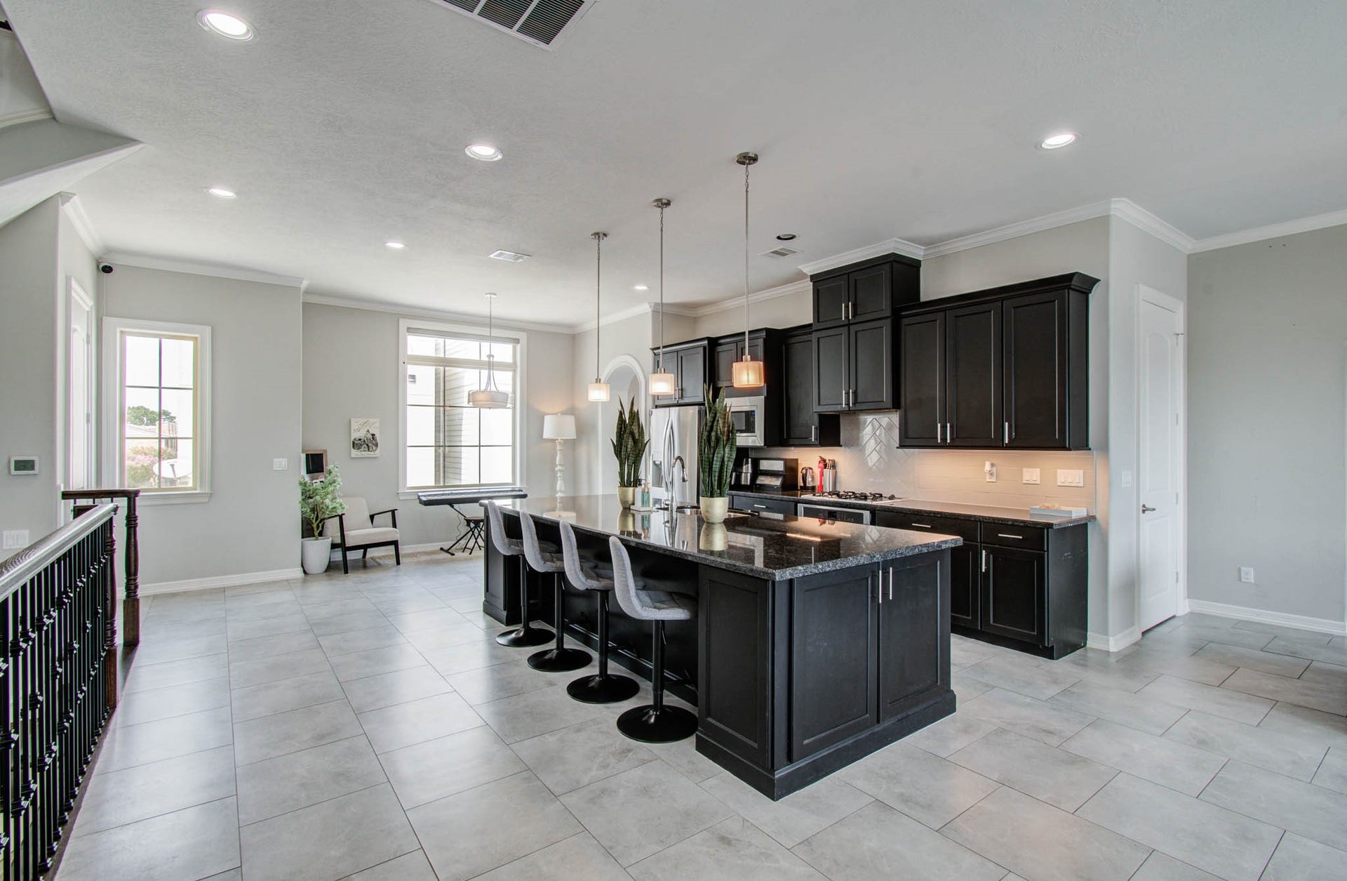 11123 Olympia Drive, Houston, TX 77042 Massive open kitchen, dining, and living concept.