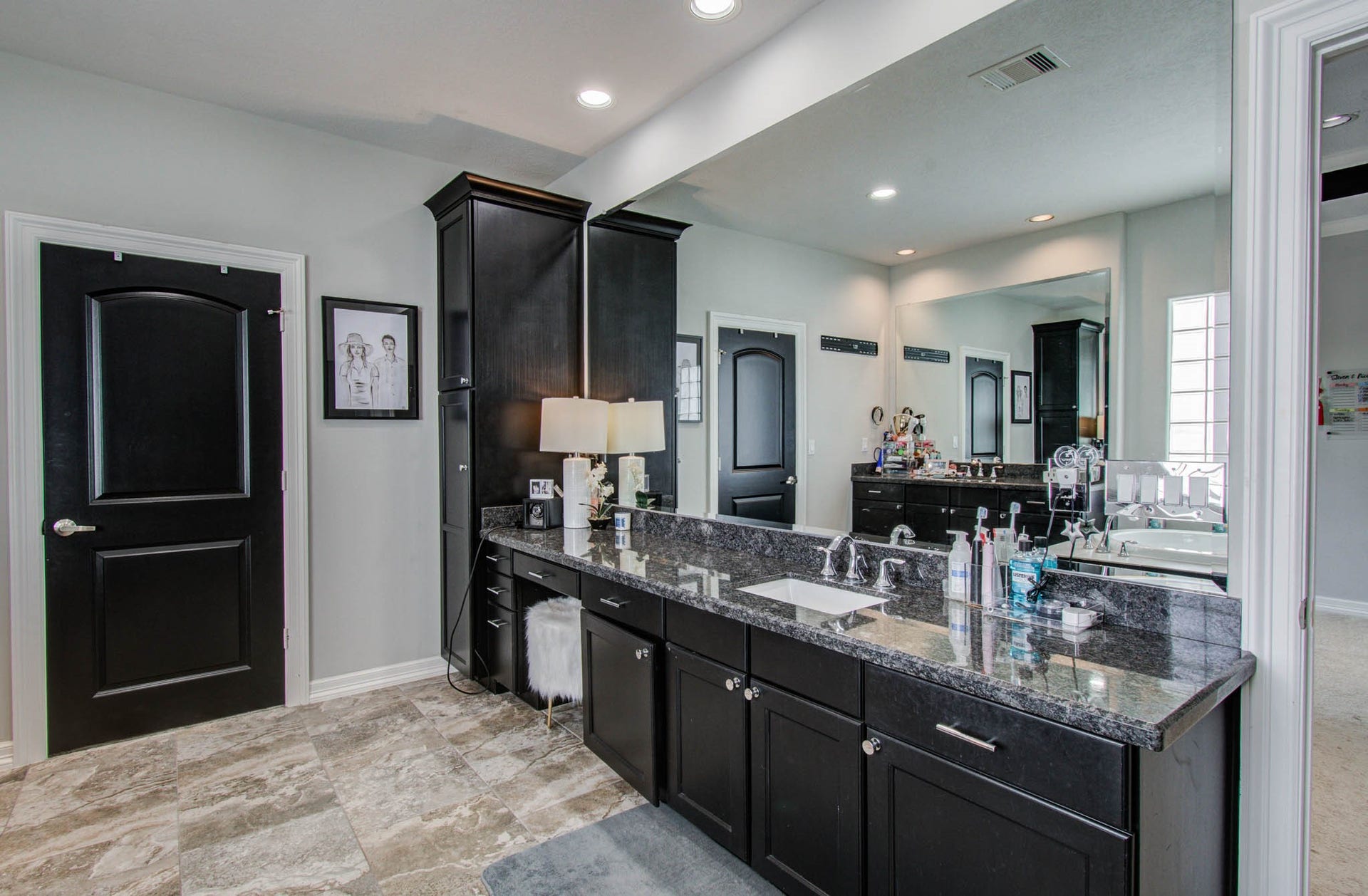 11123 Olympia Drive, Houston, TX 77042 Primary bathroom with 2 walk in closets, separate tub and shower.