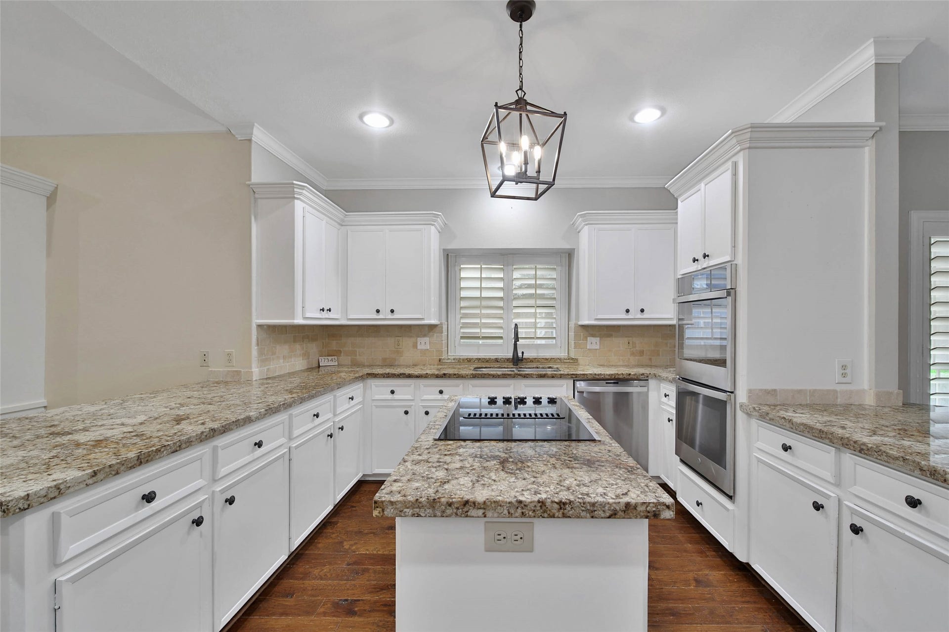 5814 Woodland Creek Drive, Kingwood, TX 77345 Lots of cabinetry and countertop for the chef in you! This kitchen is a food preppers paradise!