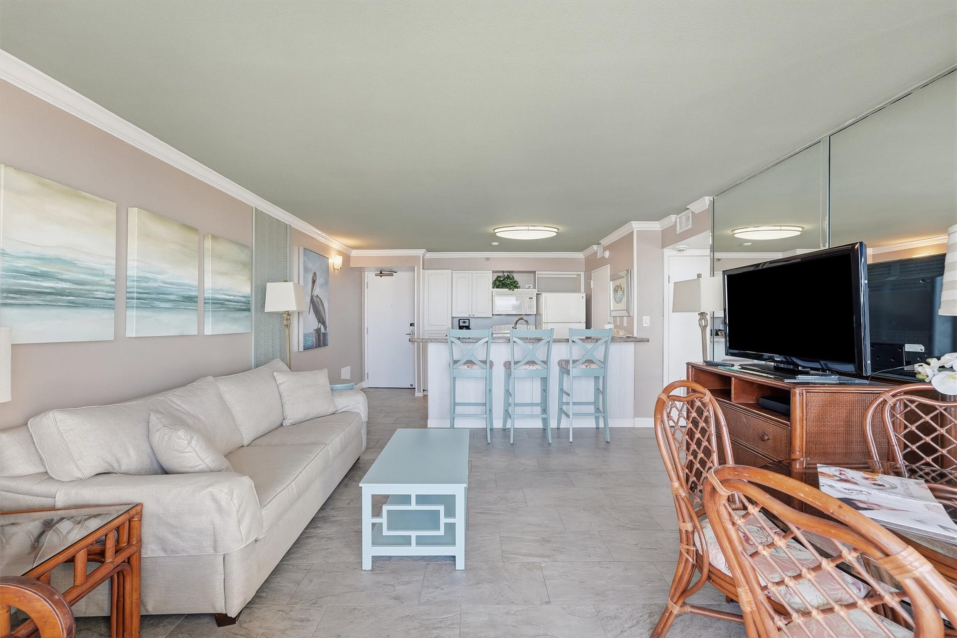 5220 Seawall Boulevard, #1233D, Galveston, TX 77551 Tile flooring and soft coastal colors flow throughout the open living and kitchen areas.