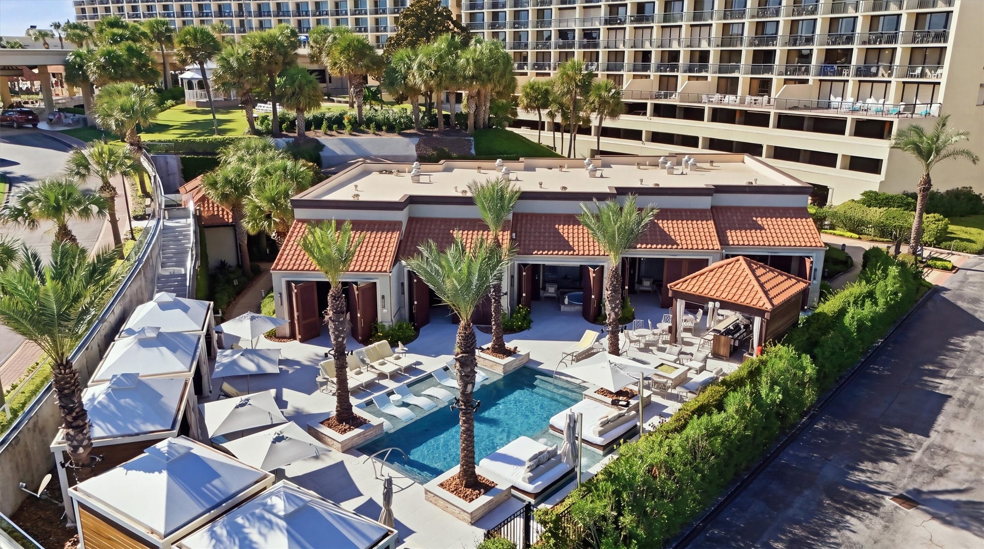 5220 Seawall Boulevard, #1233D, Galveston, TX 77551 Poolside cabanas and shaded lounging spaces create a relaxing retreat for sunny afternoons.