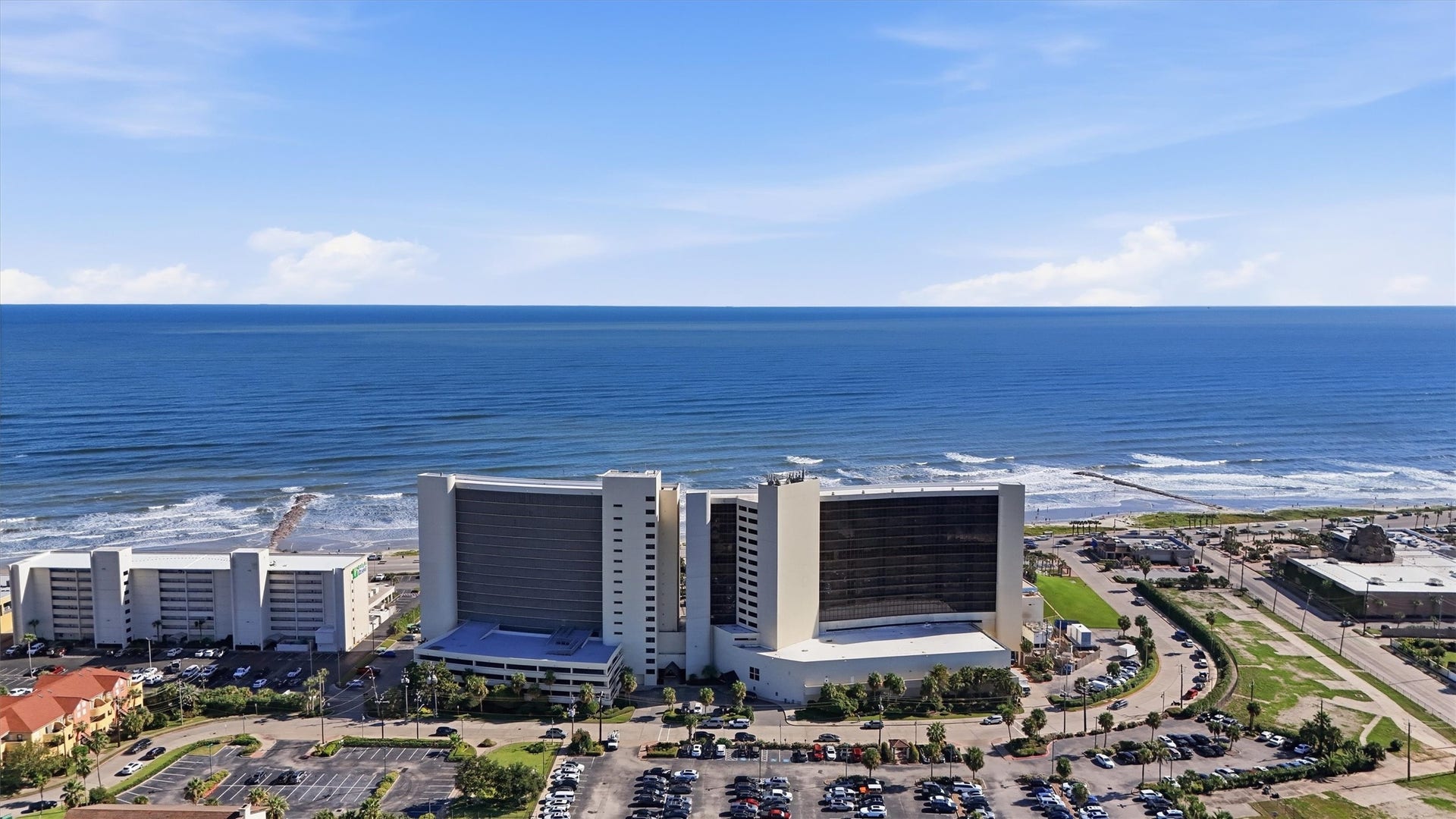 5220 Seawall Boulevard, #1233D, Galveston, TX 77551 The sparkling Gulf provides a stunning backdrop to this established coastal landmark.