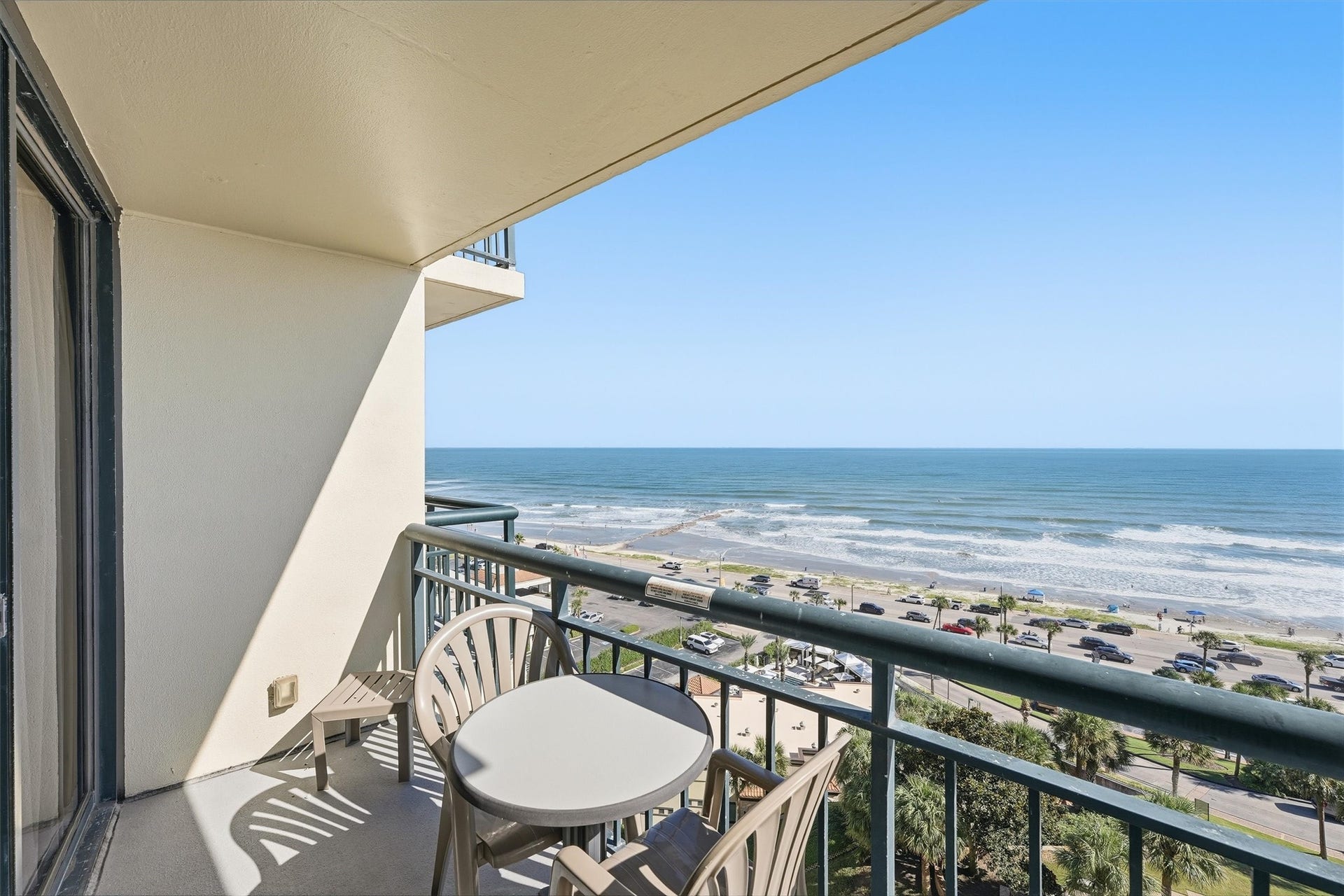 5220 Seawall Boulevard, #1233D, Galveston, TX 77551 Step onto the bedroom balcony and enjoy beautiful views of the beach and sparkling Gulf waters.
