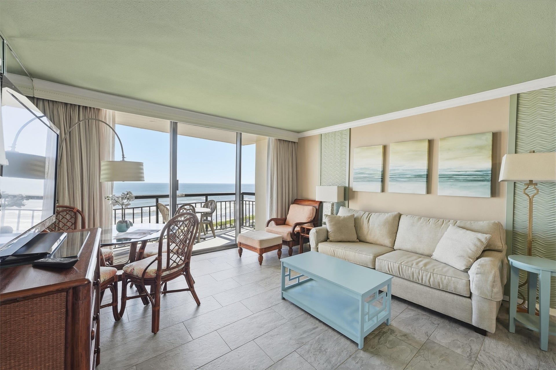 5220 Seawall Boulevard, #1233D, Galveston, TX 77551 Relax after a day at the beach in this inviting living space with direct balcony access.
