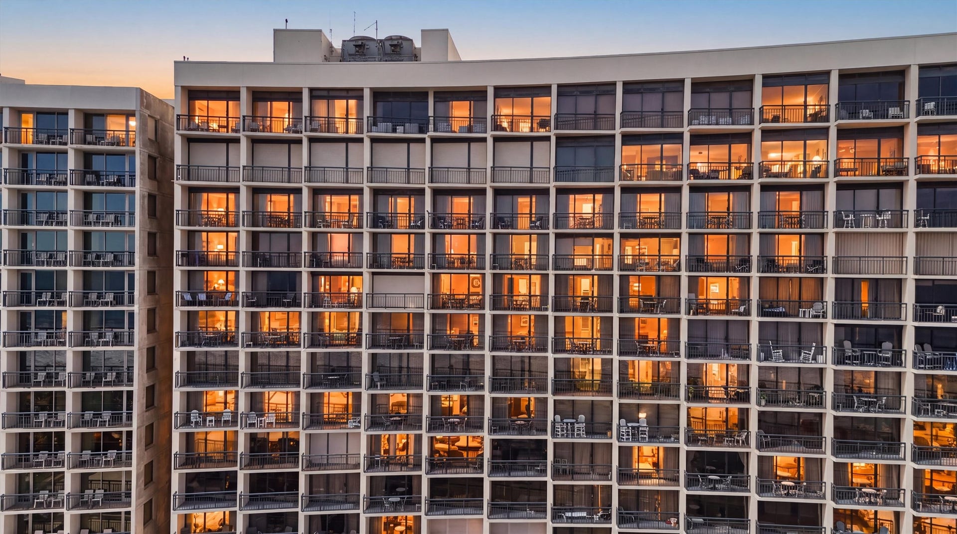 5220 Seawall Boulevard, #1233D, Galveston, TX 77551 The San Luis glows at twilight, creating a beautiful backdrop for your coastal getaway.