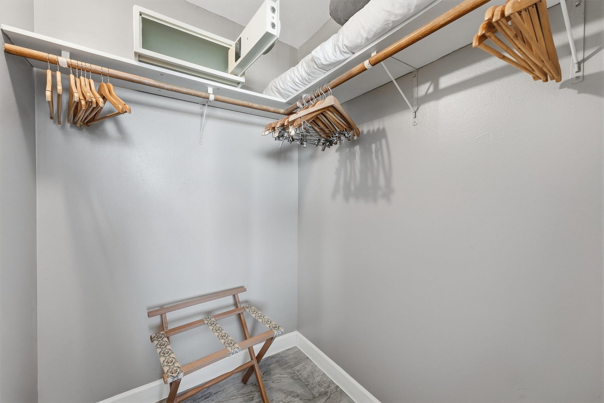 5220 Seawall Boulevard, #1233D, Galveston, TX 77551 A walk-in closet offers wraparound hanging space and upper shelving for convenient storage.