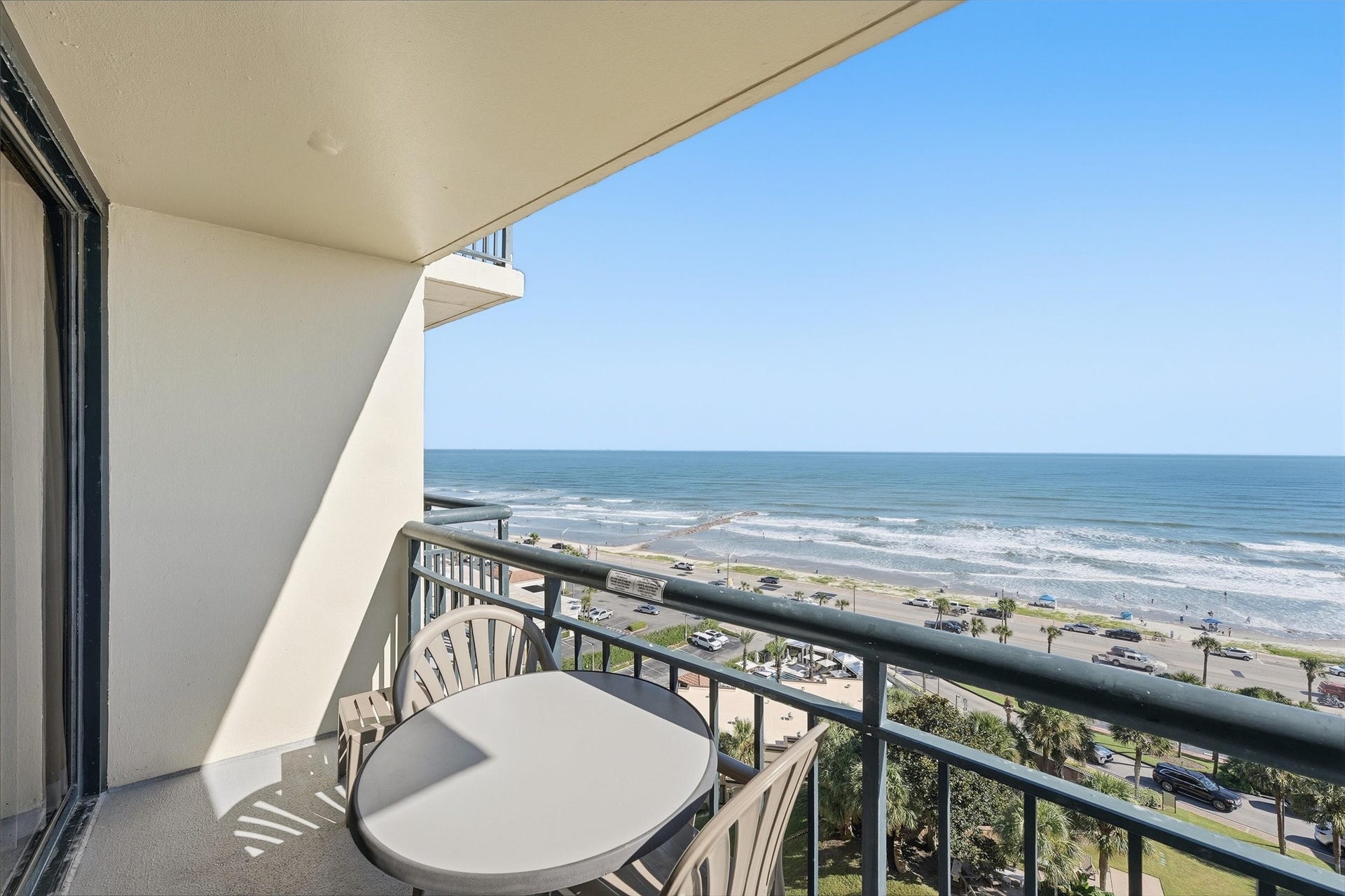 5220 Seawall Boulevard, #1233D, Galveston, TX 77551 Start your morning on the covered balcony overlooking the beach and sparkling Gulf waters.