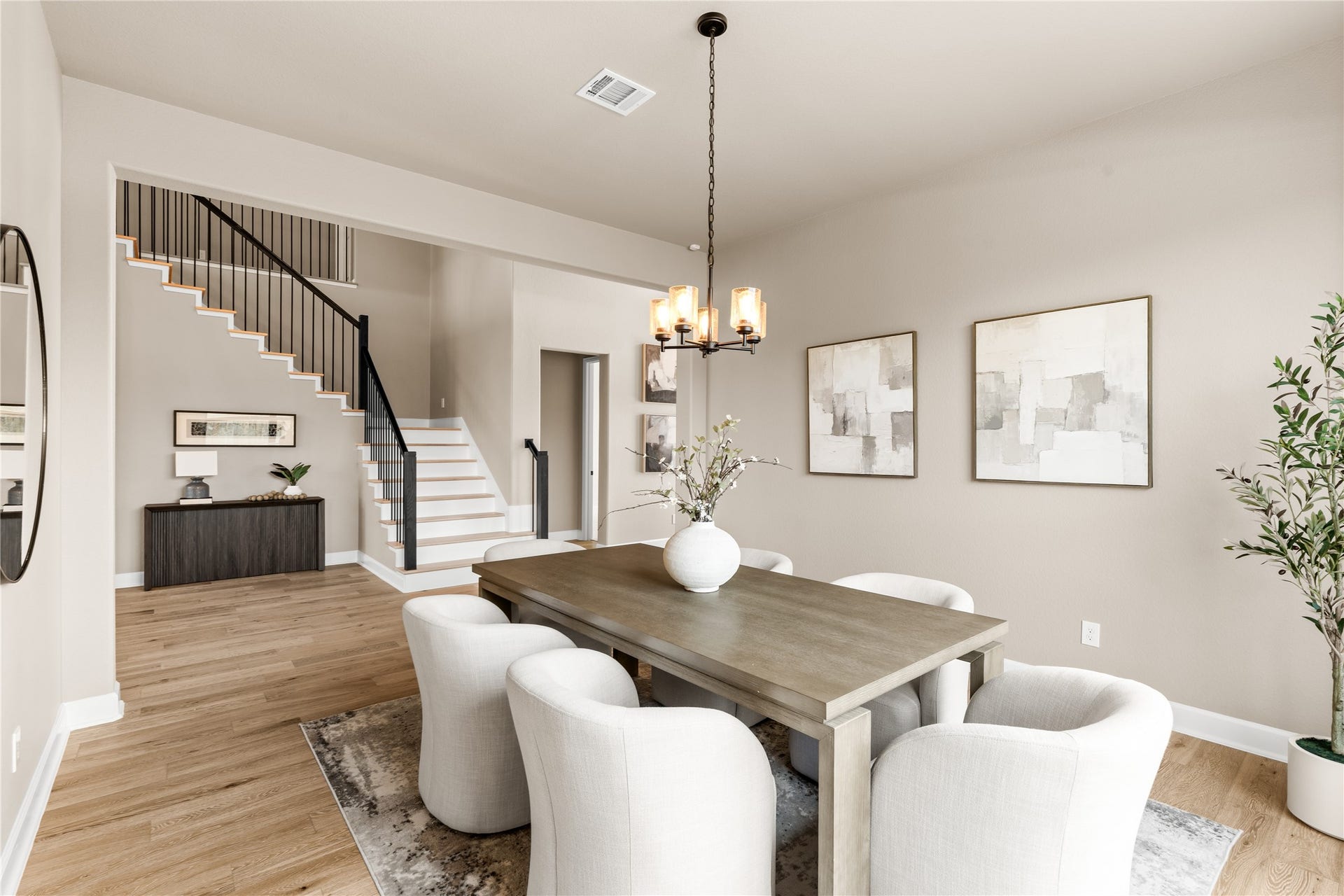 9607 Maple Wood Drive, Missouri City, TX 77459 The dining area features a beautiful neutral color palette, perfect for dinner parties or intimate gatherings. *Virtually Staged*
