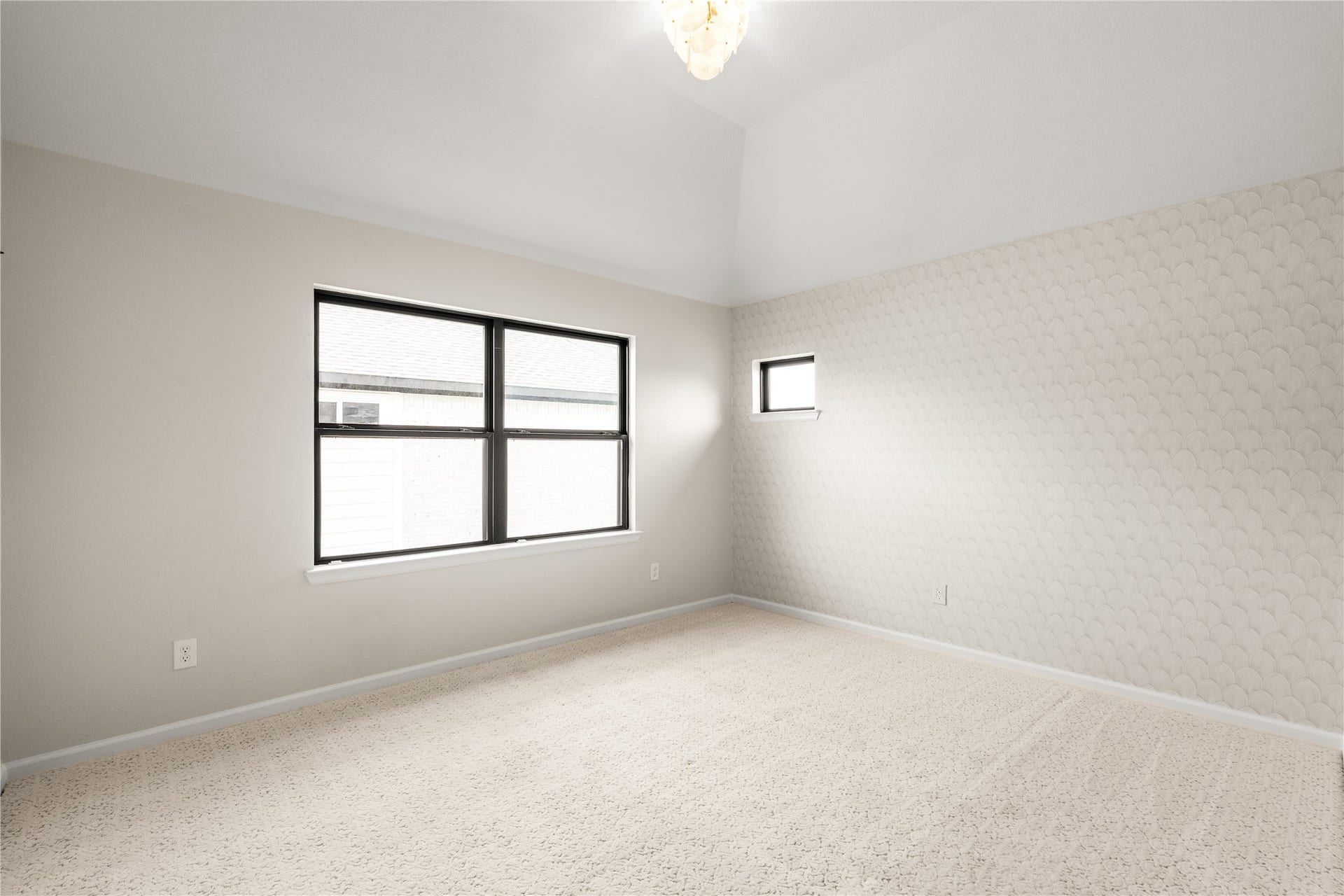 9607 Maple Wood Drive, Missouri City, TX 77459 Bright and spacious bedroom with soft carpet, neutral tones, and ample natural light from large windows.