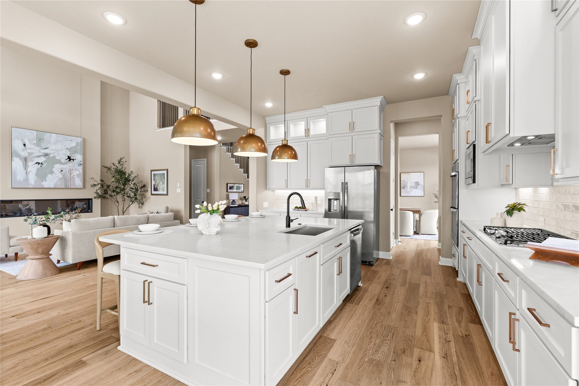 9607 Maple Wood Drive, Missouri City, TX 77459 Never feel left out of the conversation! Your family and guests can easily mingle between the airy living room and expansive kitchen. *Virtually Staged*