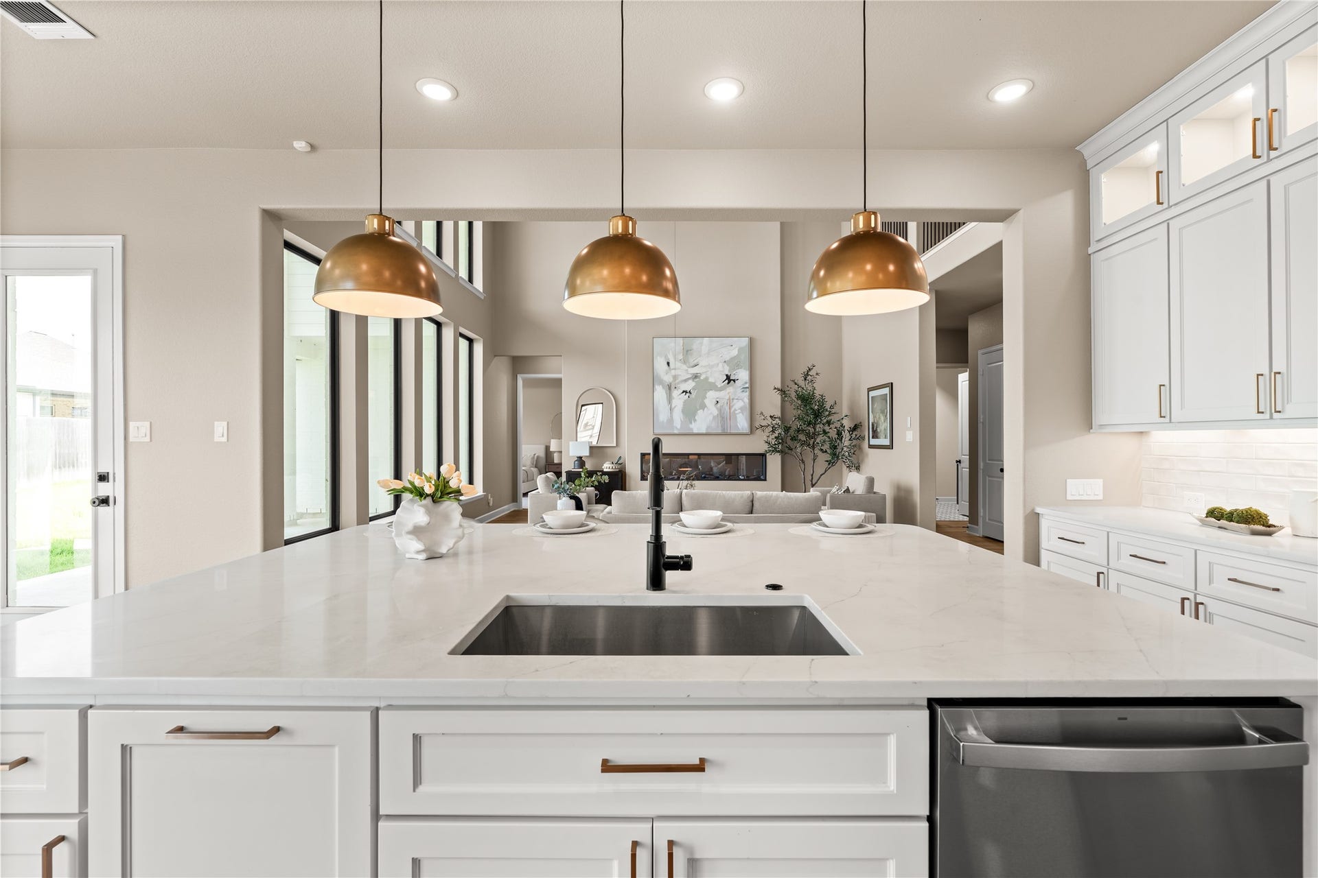 9607 Maple Wood Drive, Missouri City, TX 77459 Gorgeous pendant lights and quartz countertops. You can't go wrong with this gourmet kitchen. *Virtually Staged*