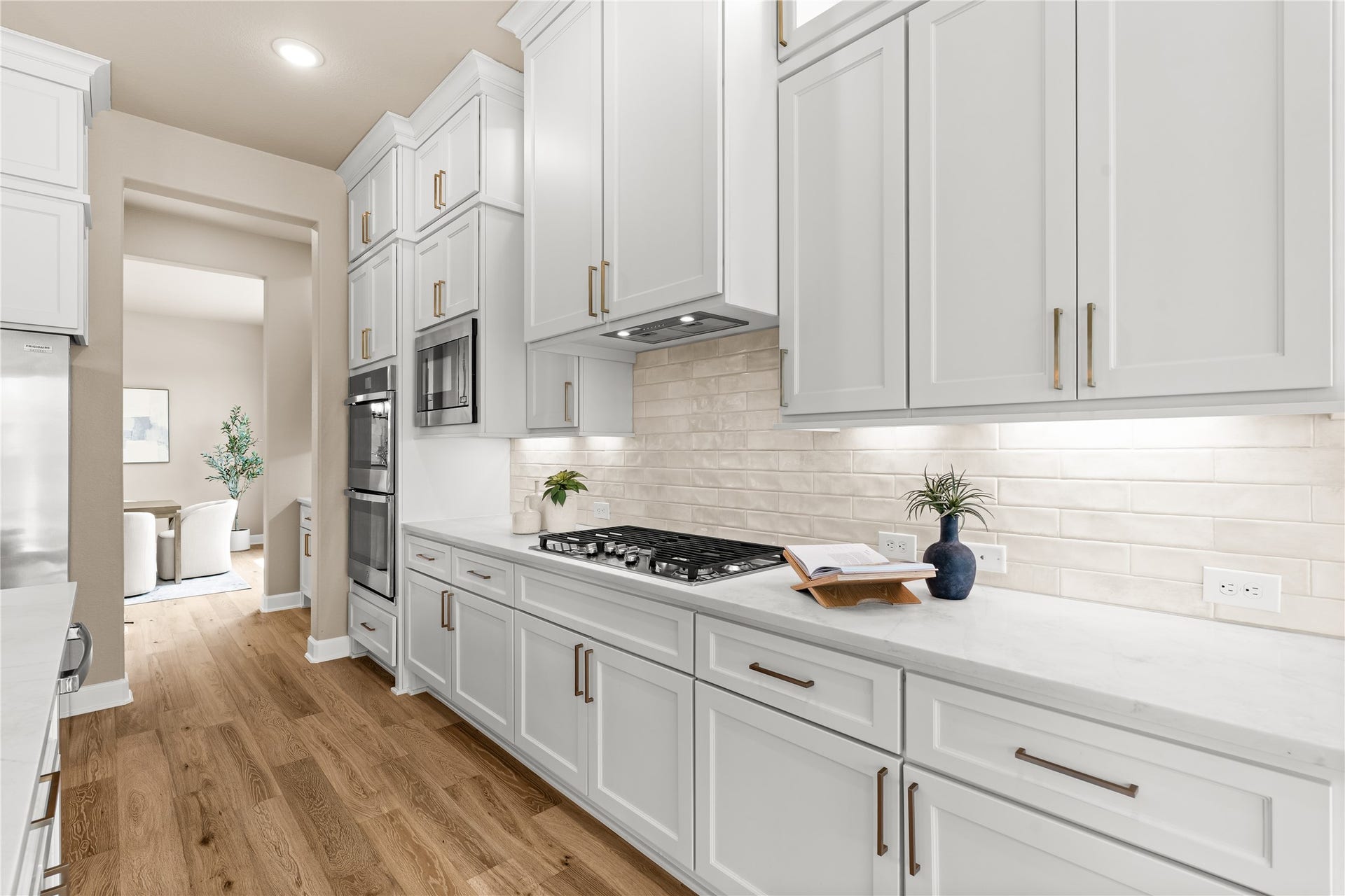 9607 Maple Wood Drive, Missouri City, TX 77459 Gourmet kitchen for the chef in your life with a gas cooktop and all the cabinet space you could need for every tool and gadget imaginable. *Virtually Staged*
