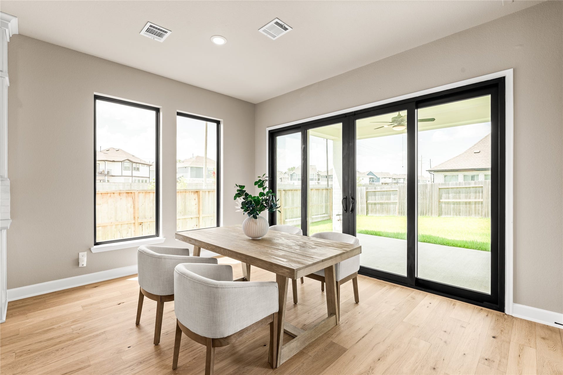 9607 Maple Wood Drive, Missouri City, TX 77459 Ideal breakfast area that extends the gathering onto your covered patio. *Virtually Staged*
