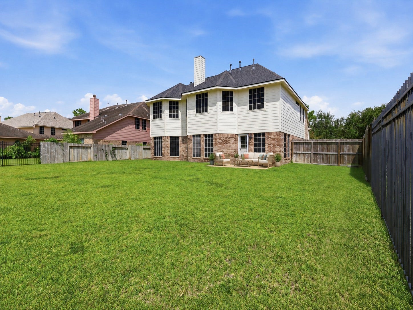 13806 Cove Landing Lane, Rosharon, TX 77583 A wide backyard provides generous room for recreation, entertaining, or future outdoor improvements.**Virtually staged