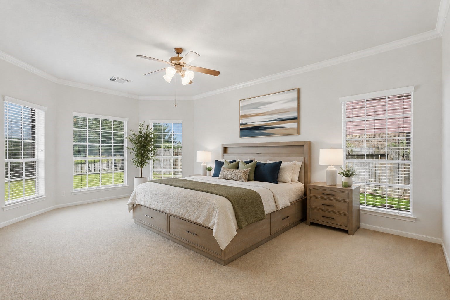 13806 Cove Landing Lane, Rosharon, TX 77583 The spacious primary suite features multiple windows, abundant natural light, and crown molding for a polished finish.**Virtually staged