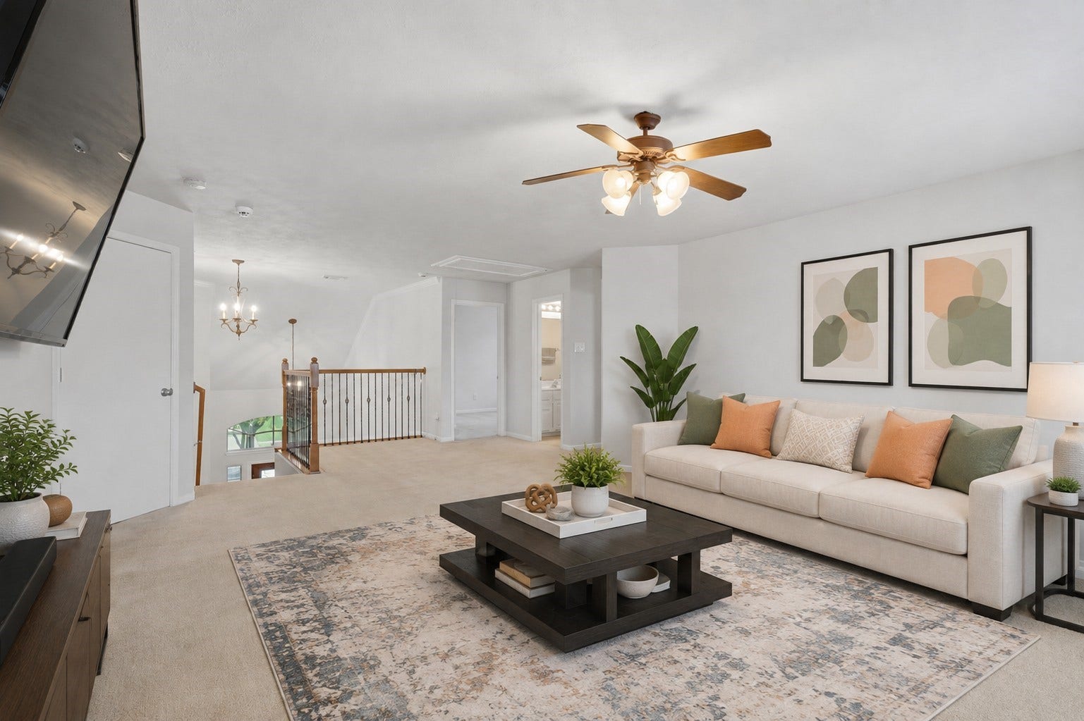 13806 Cove Landing Lane, Rosharon, TX 77583 Another view of the upstairs game room highlights its open layout, spacious proportions, and connection to the second-floor landing.**Virtually staged
