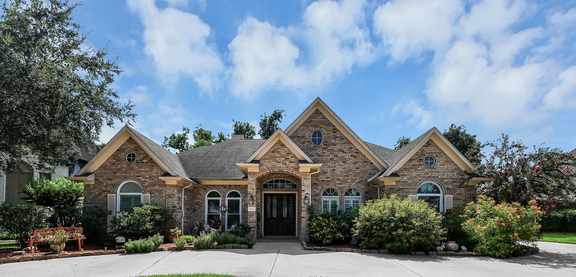 2627 Old South Drive, Richmond, TX 77406 Set on an expansive GOLF COURSE lot with a POOL, this custom-built home is truly special.