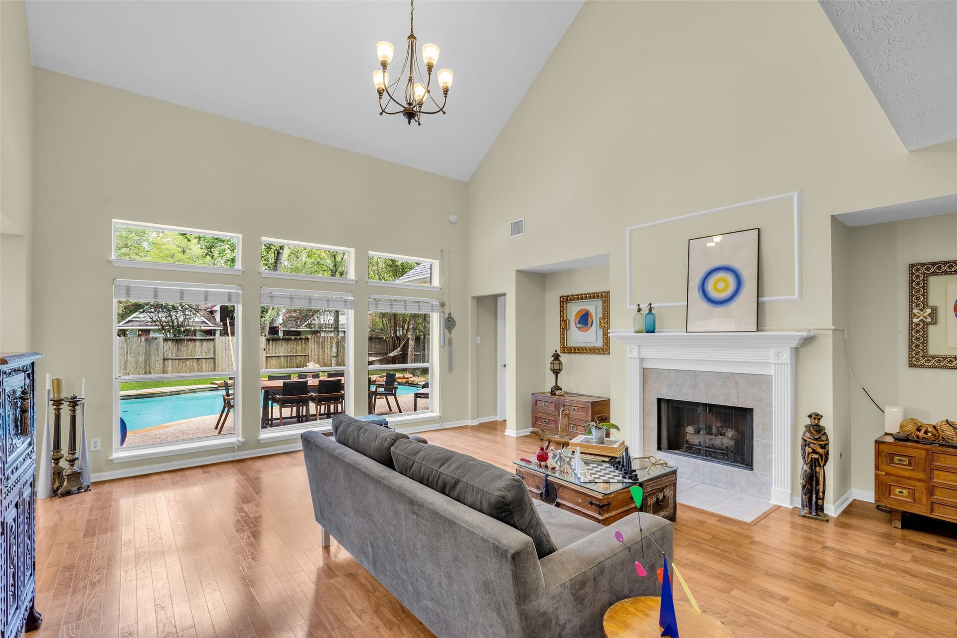 119 N Westwinds Circle, The Woodlands, TX 77382 Wall of windows overlook the backyard oasis!