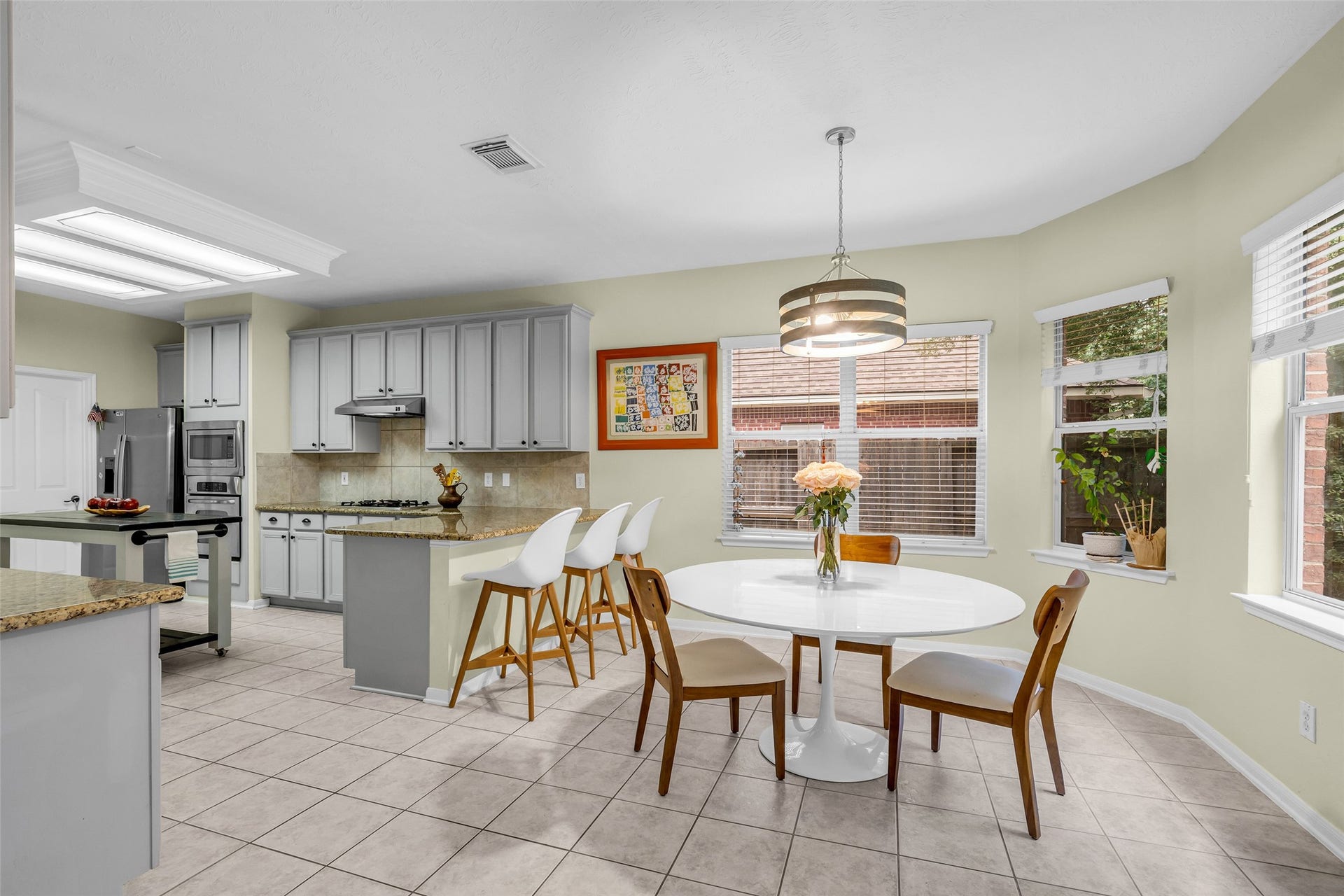 119 N Westwinds Circle, The Woodlands, TX 77382 Breakfast area provides a great place for family meals with easy access to the backyard.