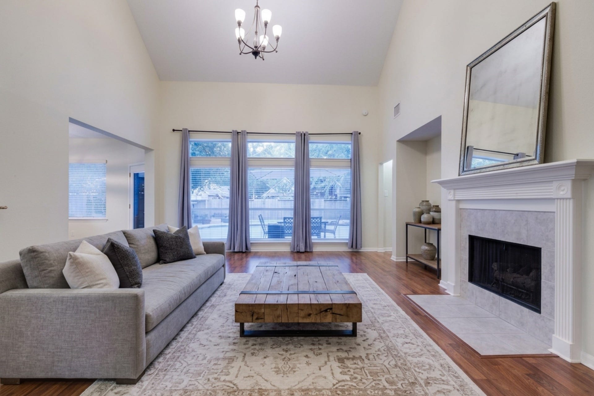 119 N Westwinds Circle, The Woodlands, TX 77382 Large two-story family room!. Digitally staged