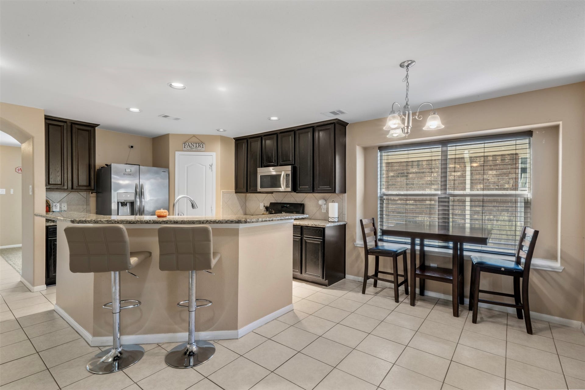 314 Gulf Winds Drive, Bacliff, TX 77518 view of kitchen and one of the two dinning areas.
