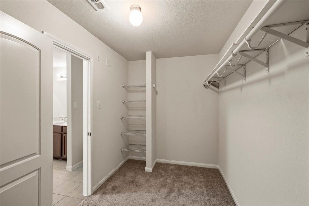 422 Hawks View Drive, La Marque, TX 77568 Primary walk in closet with plenty of space