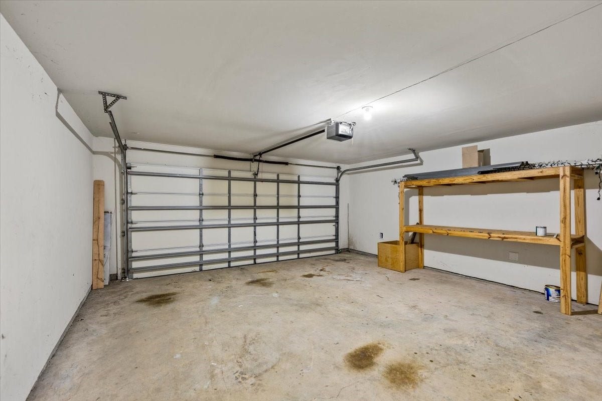 422 Hawks View Drive, La Marque, TX 77568 Two car garage with storage shelves