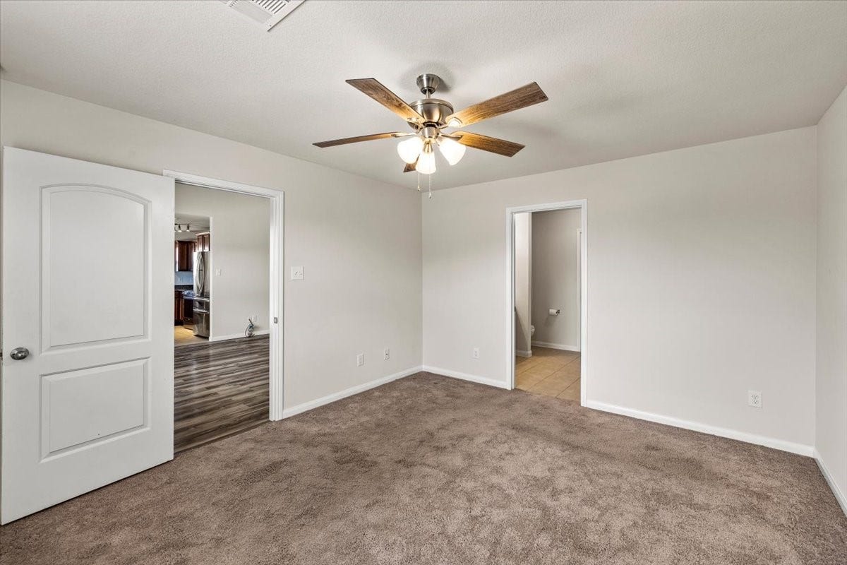 422 Hawks View Drive, La Marque, TX 77568 Primary bedroom, opposite side of the other three bedrooms