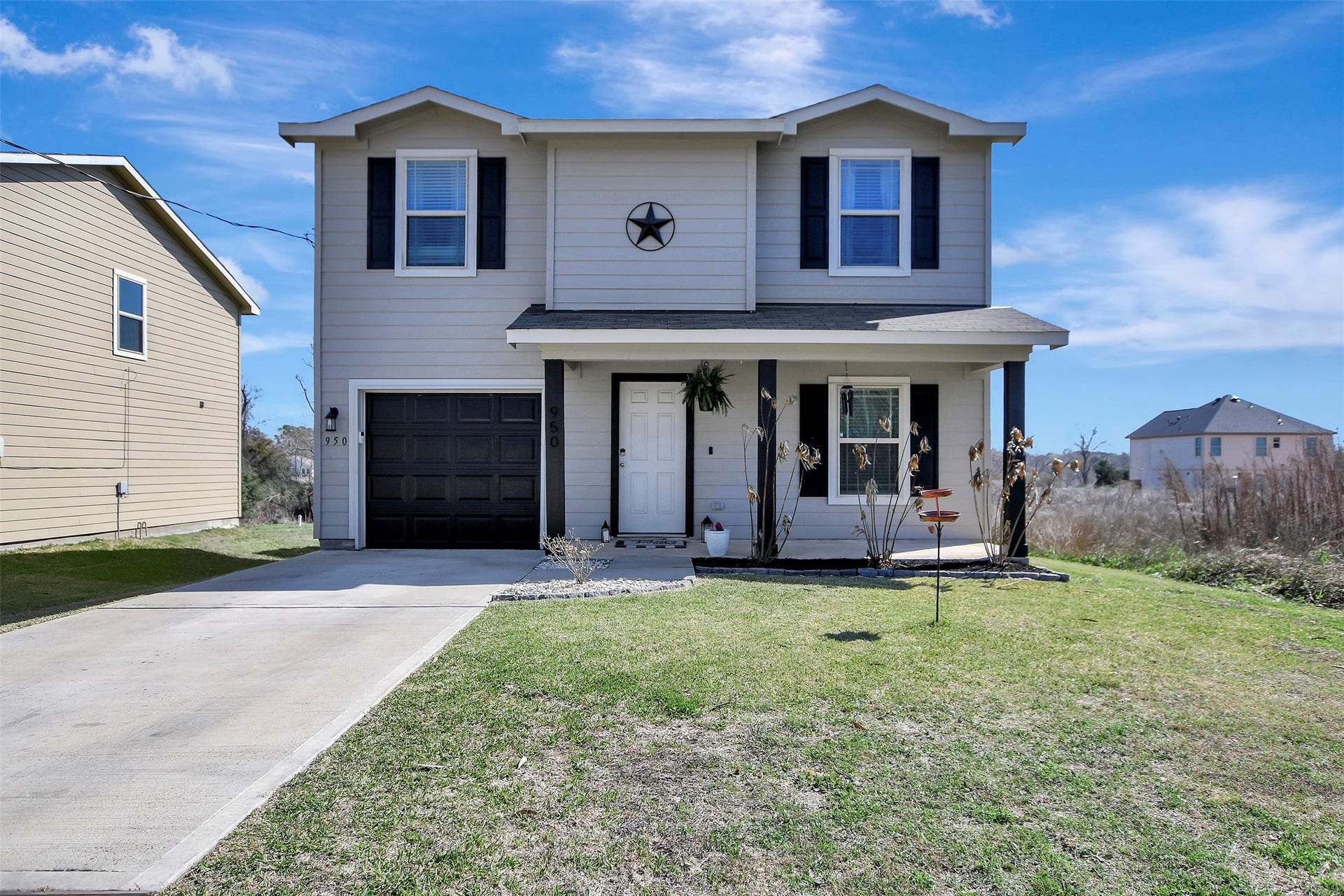 Freshly updated exterior with modern, classy finishes creating beautiful curb appeal. This two-story home sits on a spacious double lot, offering extra room to enjoy.