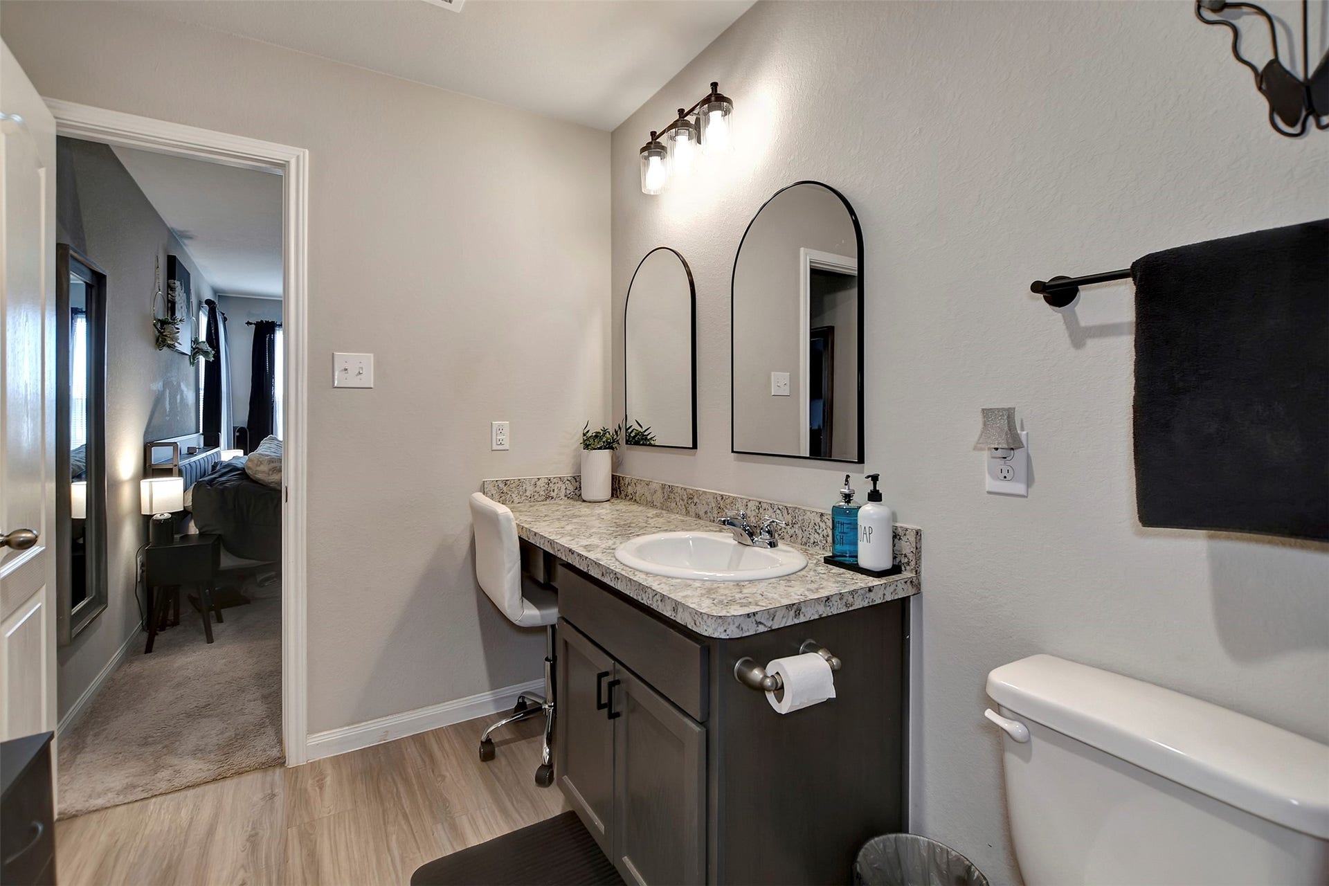 Well-appointed primary bath with modern finishes and functional layout.