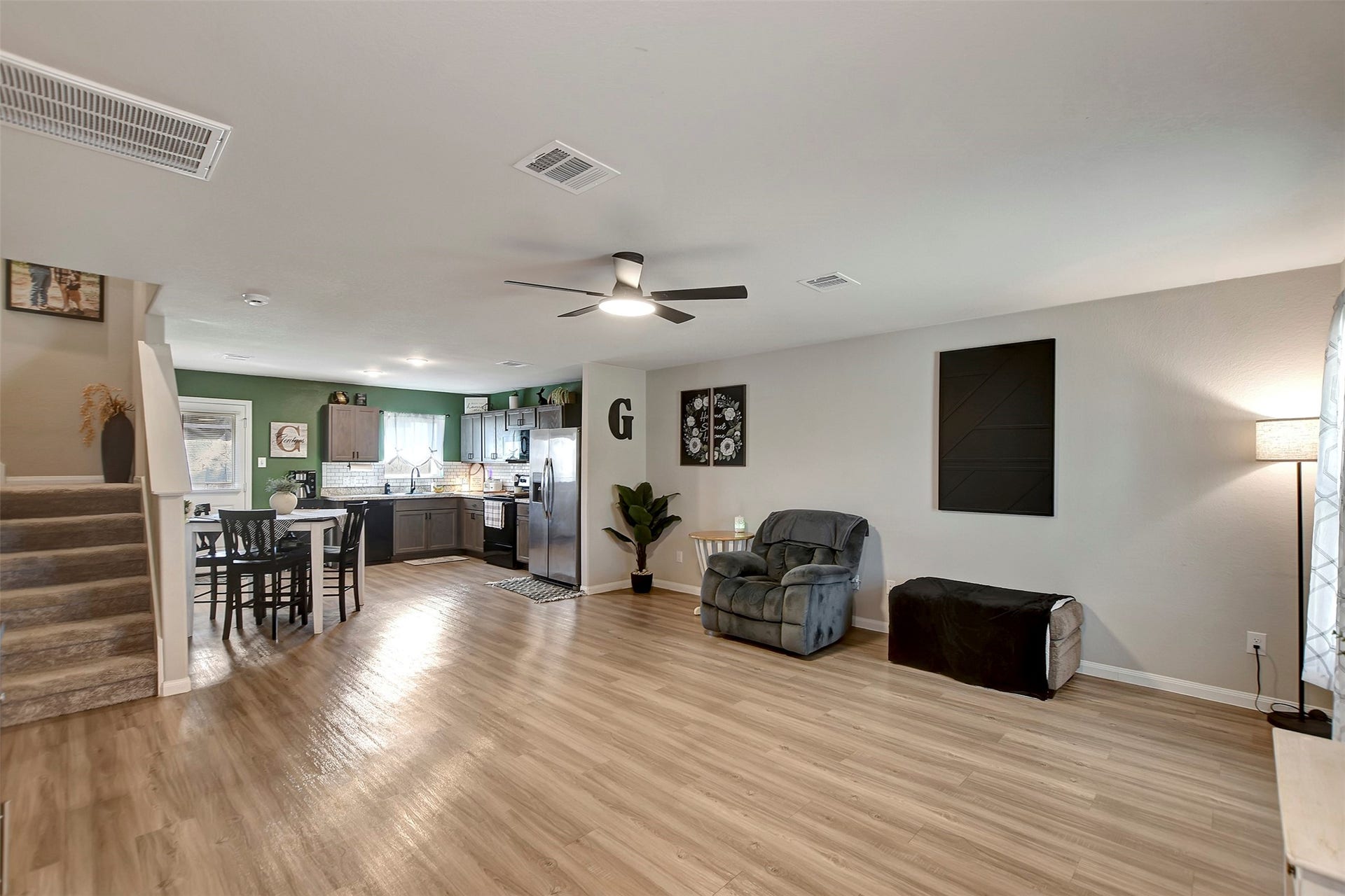 Welcoming entryway leading into an open-concept layout designed for comfortable living and entertaining.