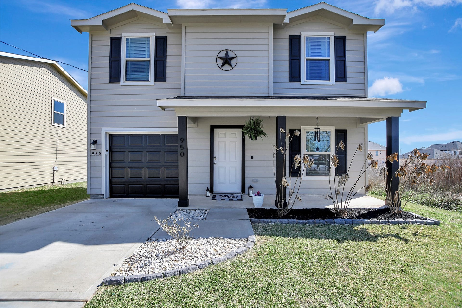 Freshly updated exterior with modern, classy finishes creating beautiful curb appeal. This two-story home sits on a spacious double lot, offering extra room to enjoy.