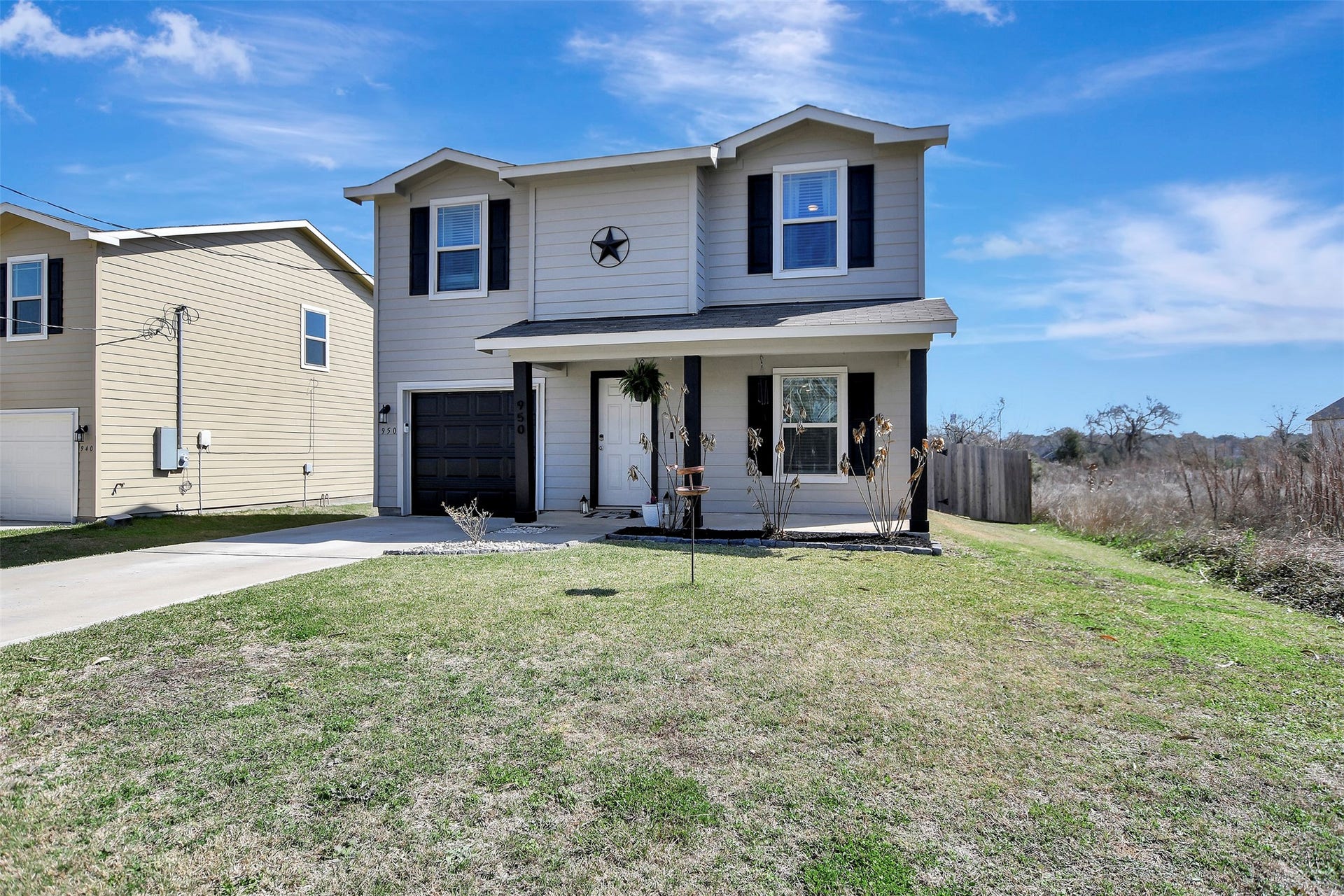 Freshly updated exterior with modern, classy finishes creating beautiful curb appeal. This two-story home sits on a spacious double lot, offering extra room to enjoy.