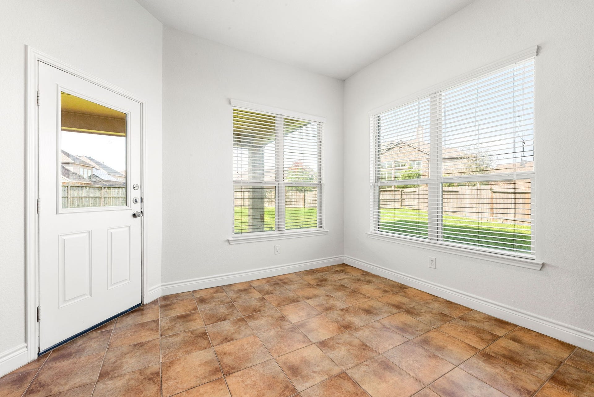 3318 Elizabeth Springs Court, Katy, TX 77494 Breakfast area looks onto spacious backyard.