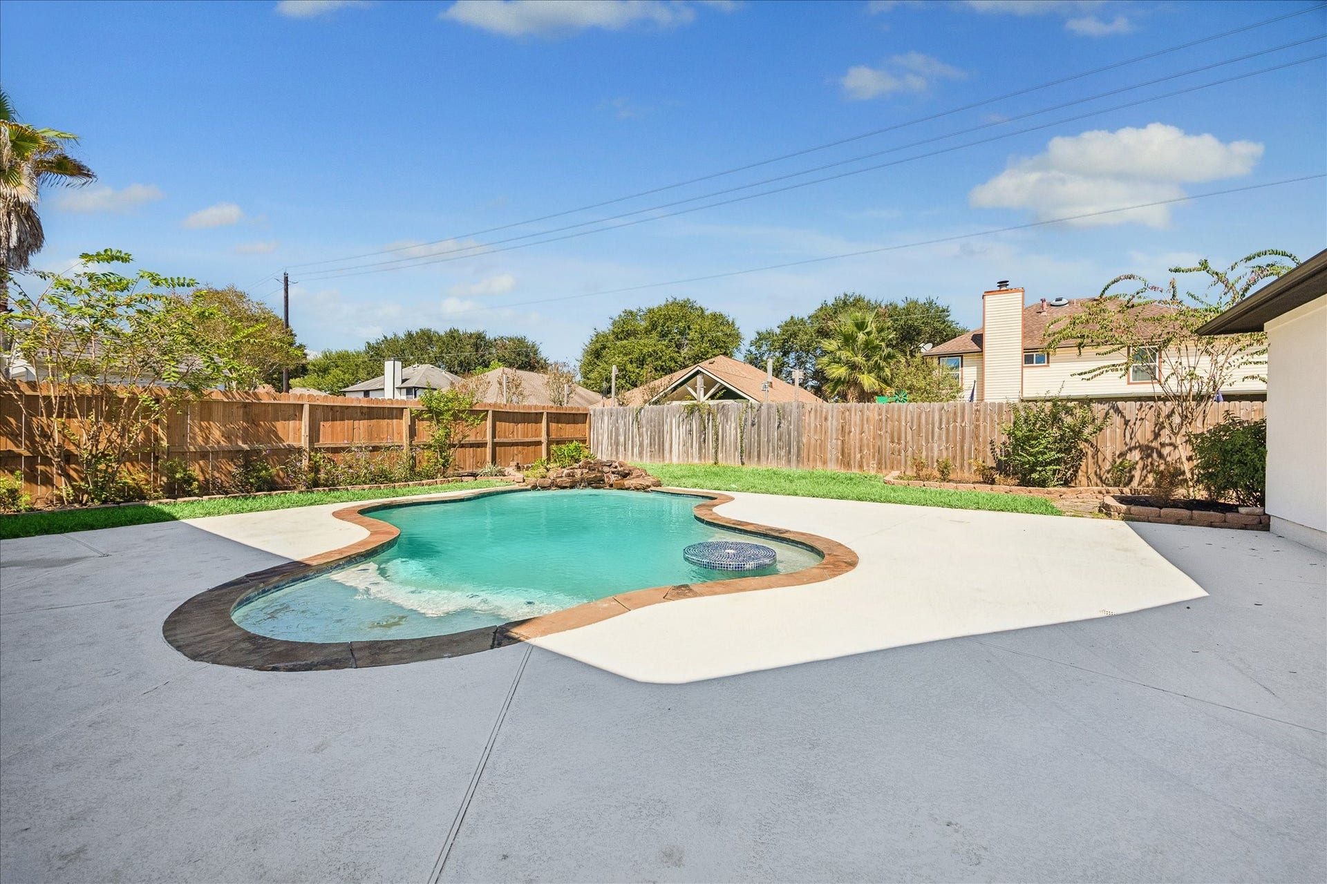 While the home is new construction the swimming pool is a preexisting feature of the property, offering a luxury amenity for relaxation and entertaining.