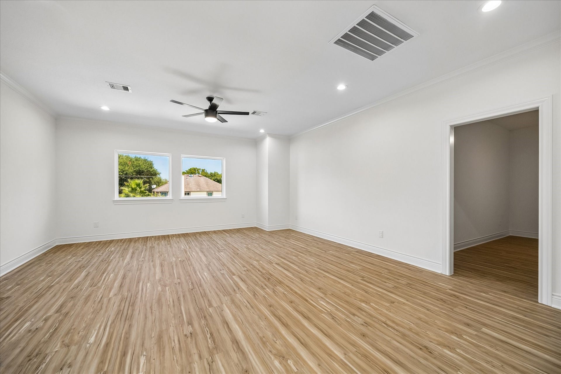 Upstairs game room offering plenty of room for entertaining.
