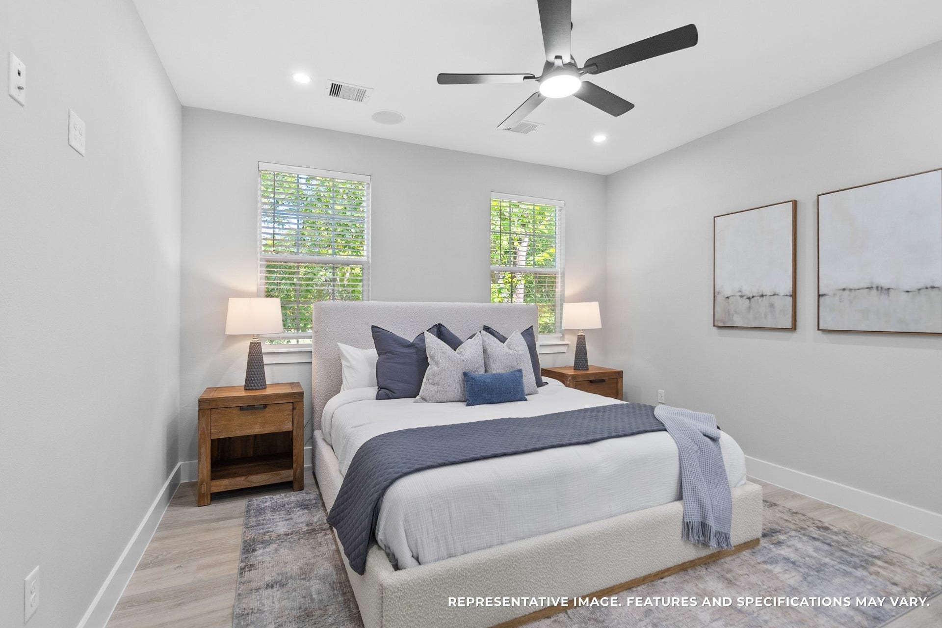 825 Paul Quinn Street, #B, Houston, TX 77091 Your primary bedroom feels like a retreat, where the soft gray tones and natural light make every morning feel fresh and calm.
