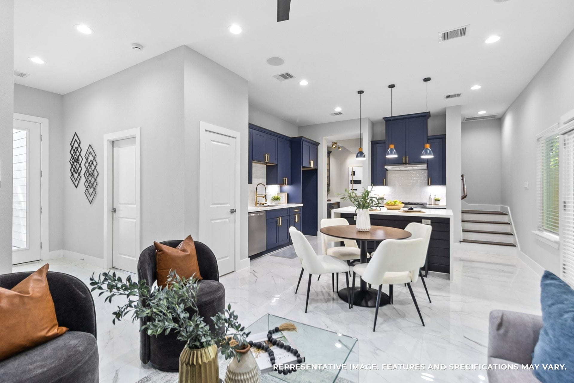 825 Paul Quinn Street, #B, Houston, TX 77091 The deep navy cabinetry with gold hardware brings such a sophisticated pop to your kitchenyou cant help but smile every time you walk in.