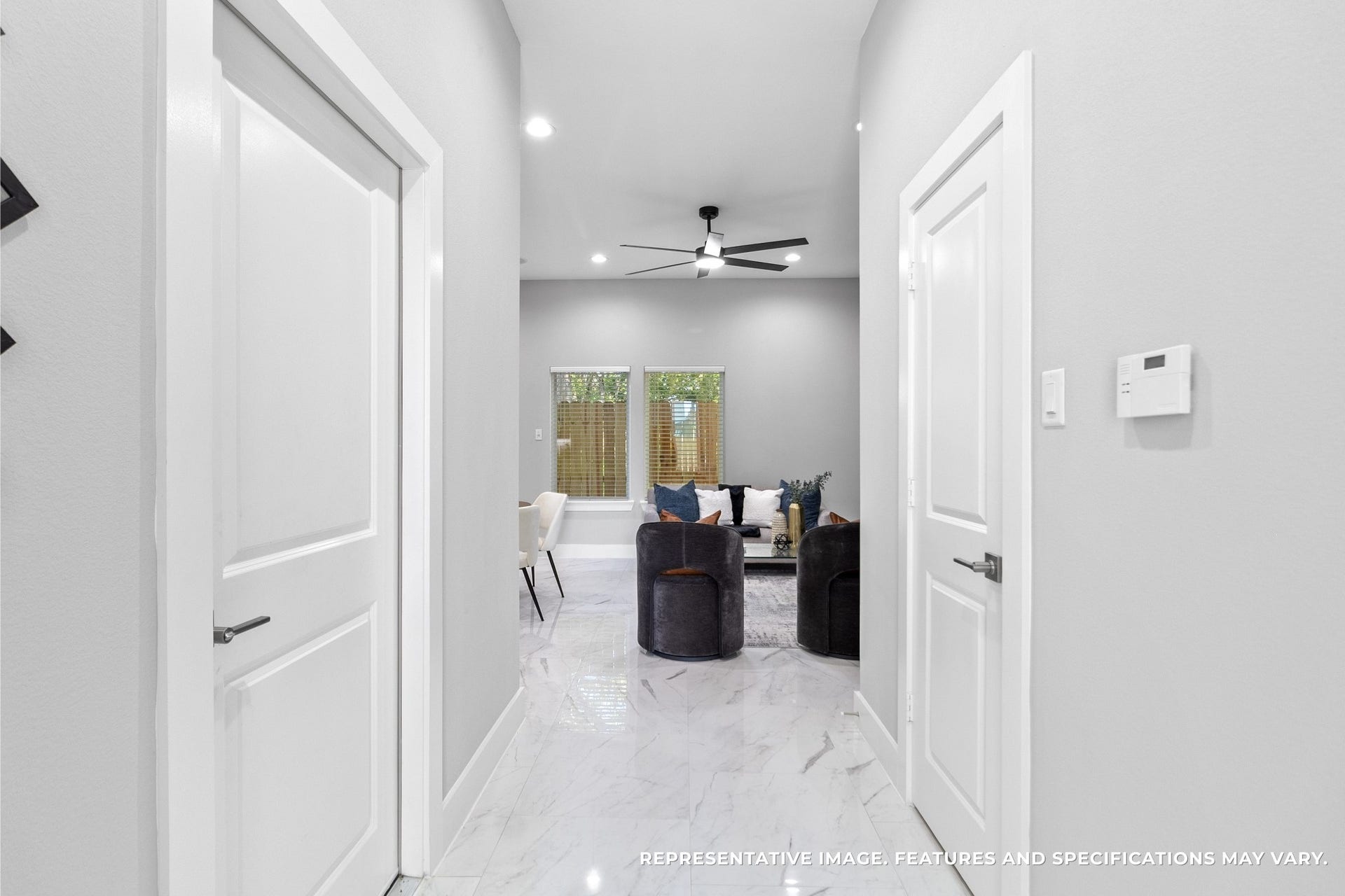 825 Paul Quinn Street, #B, Houston, TX 77091 Walking through the entry, you love how the hallway opens into your bright living space, the glossy tile floors reflecting light and leading guests right into the heart of your home.