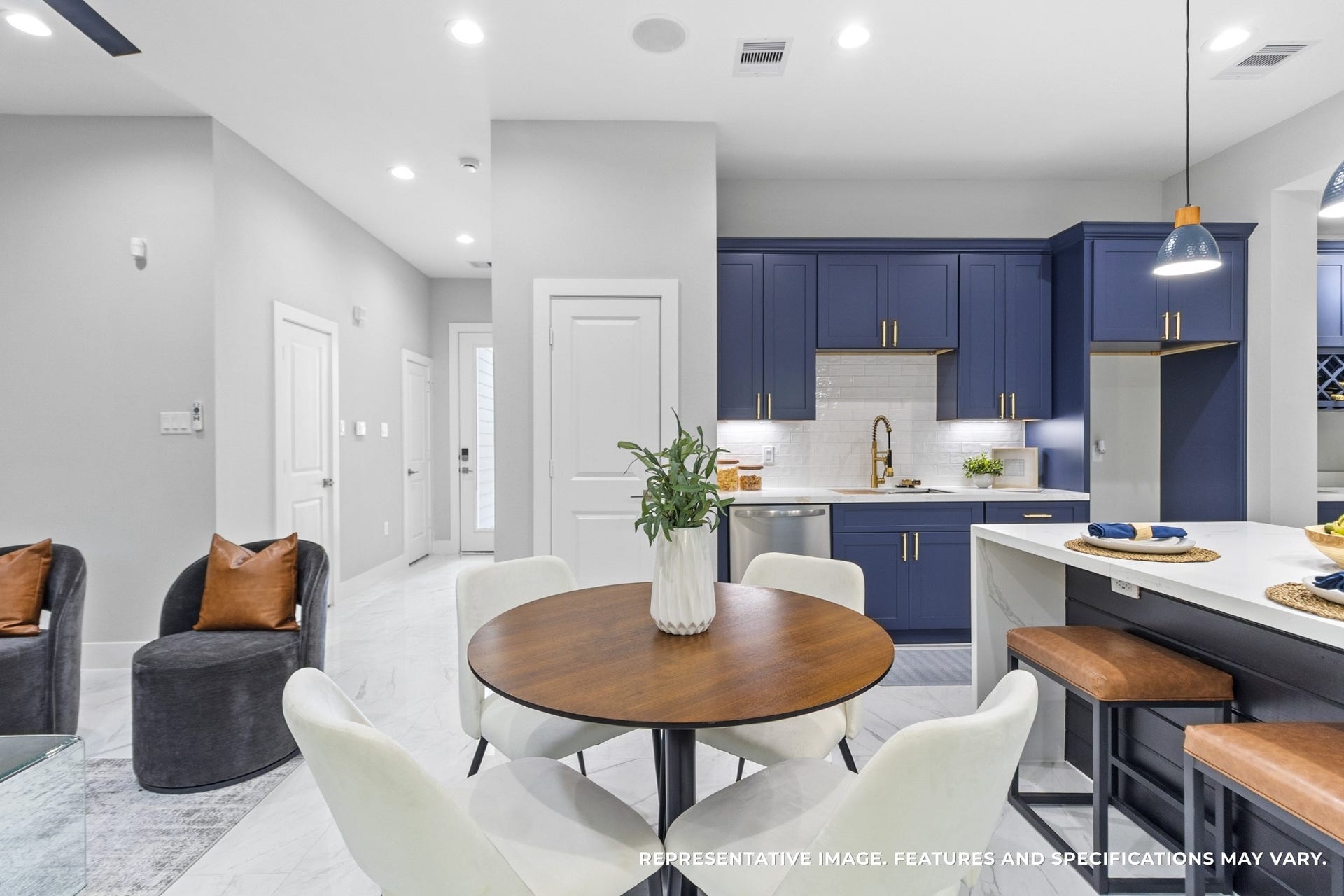 825 Paul Quinn Street, #B, Houston, TX 77091 Dinner feels relaxed around your round table, the soft lighting above setting the mood whether its a quick weekday meal or a long weekend gathering.