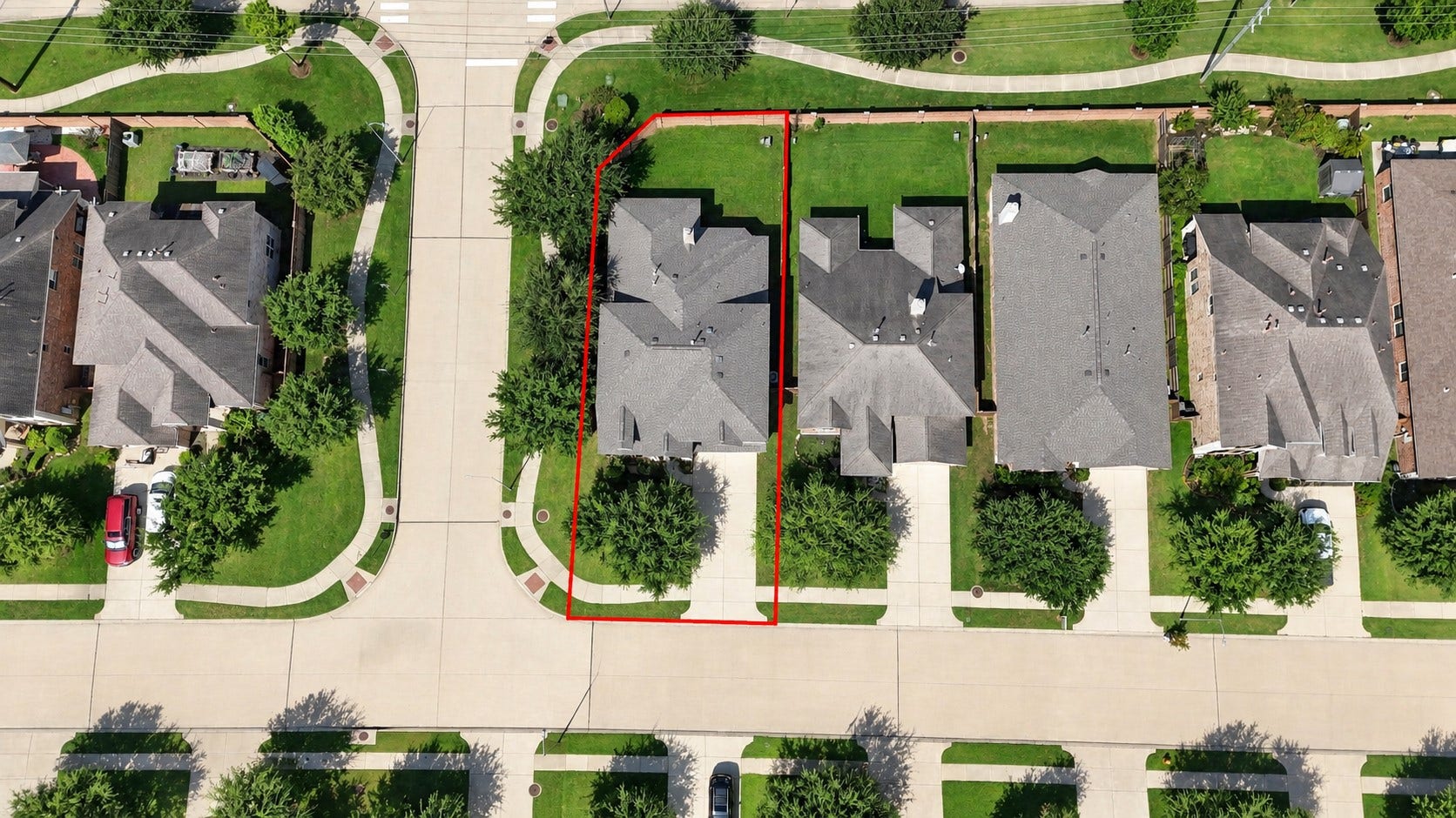 11723 Giovanni Lane, Richmond, TX 77406 Aerial View Showcasing This Wonderful Corner Lot! This birds-eye view clearly highlights the home's generous corner lot, beautifully maintained lawn, landscaped surroundings, and spacious footprint. The property enjoys a great position within the neighborhood, with attractive streetscapes and mature landscaping adding to its appeal.