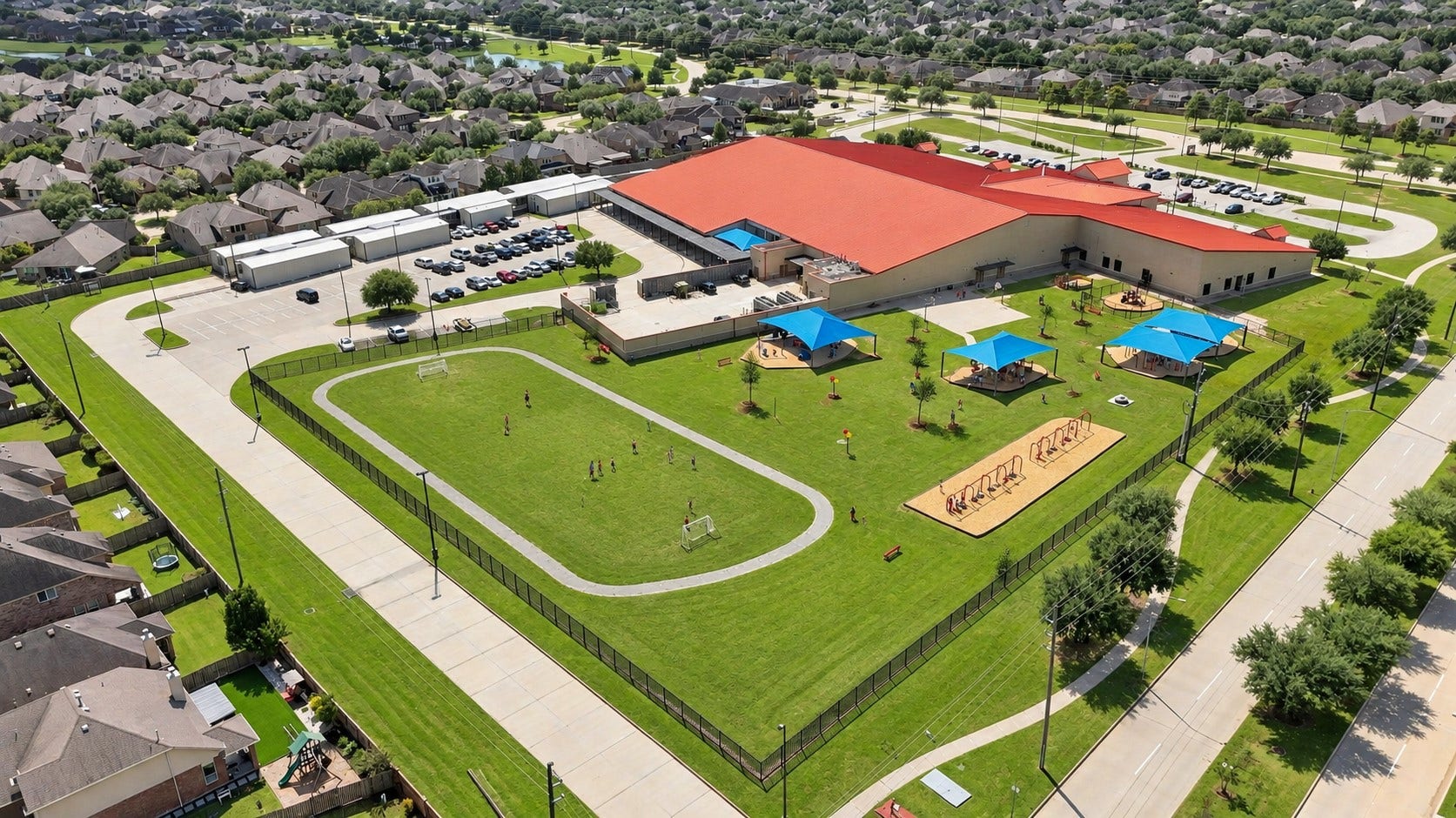 11723 Giovanni Lane, Richmond, TX 77406 Resort-Style Amenities Right in the Neighborhood! This beautiful aerial view showcases a wonderful community amenity area with expansive green space, recreational courts, a swimming pool, playground areas, and walking paths. It is easy to see why residents enjoy having so many opportunities for recreation, relaxation, and outdoor fun close to home!